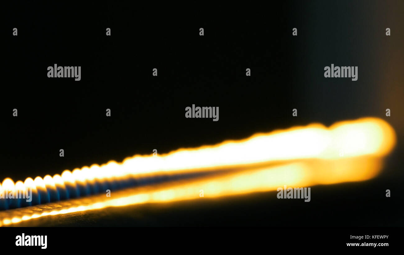 Pipe with fire in the chemistry laboratory close up. Gas system in the ...