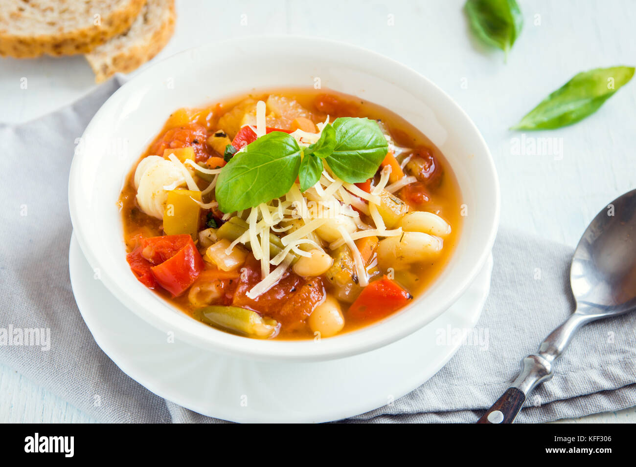 Premium Photo  Healthy homemade vegetable soup fresh and ready to eat - on  wooden table, parmesan cheese