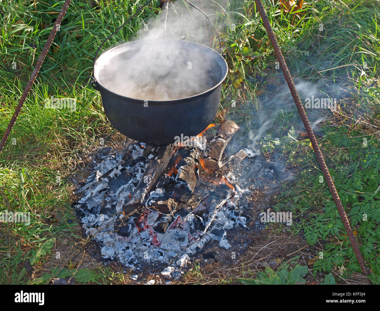 Boiling water on campfire hires stock photography and images Alamy