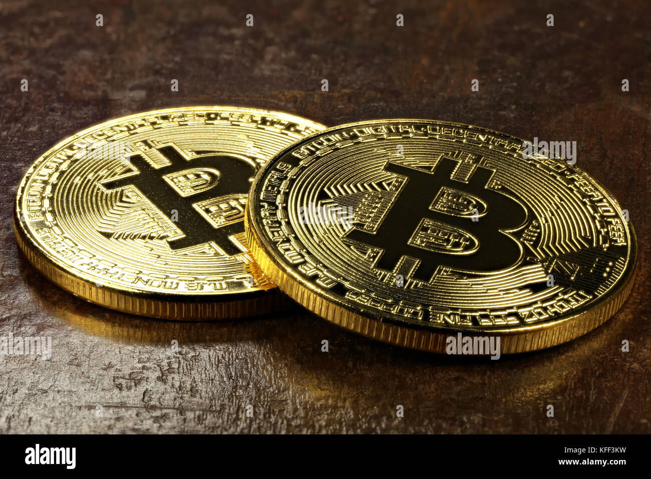 golden bitcoins on wooden background Stock Photo