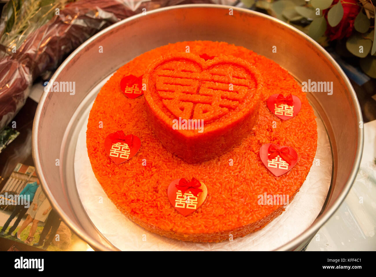 traditional red rice cake in a tin box gift from grooms family to ...