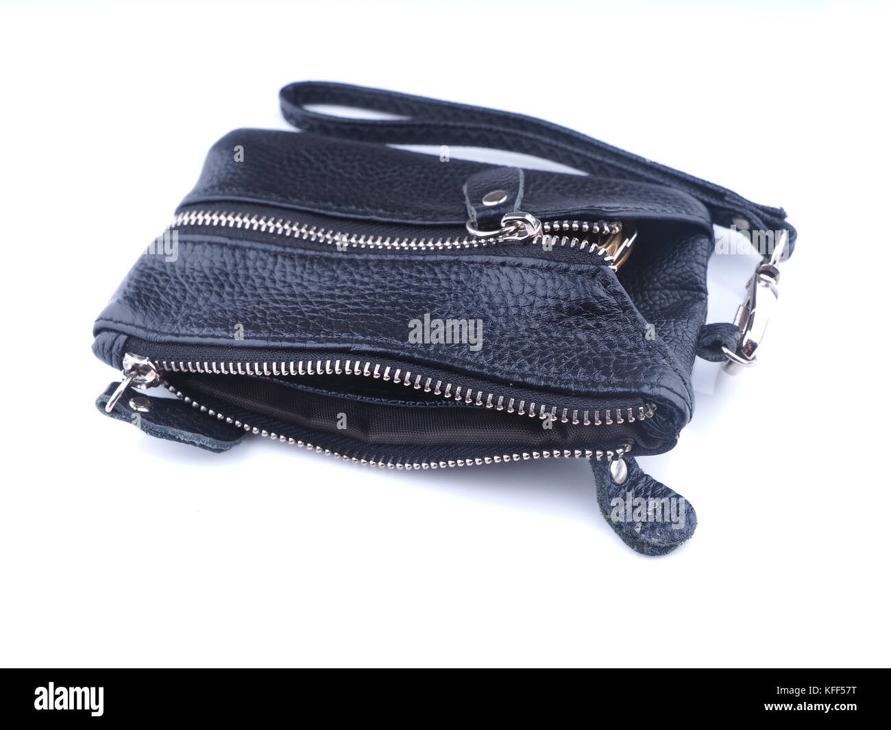 black purse with keys on a white background Stock Photo - Alamy