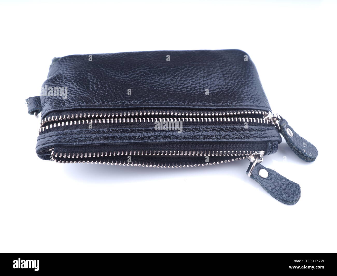 black purse with keys on a white background Stock Photo - Alamy
