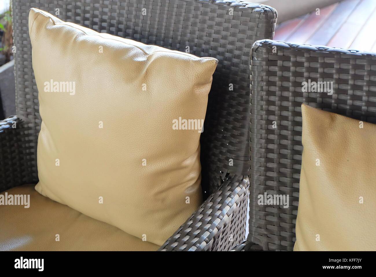 Modern Cozy Rattan Sofa with Brown Leather Cushion for Home Decoration