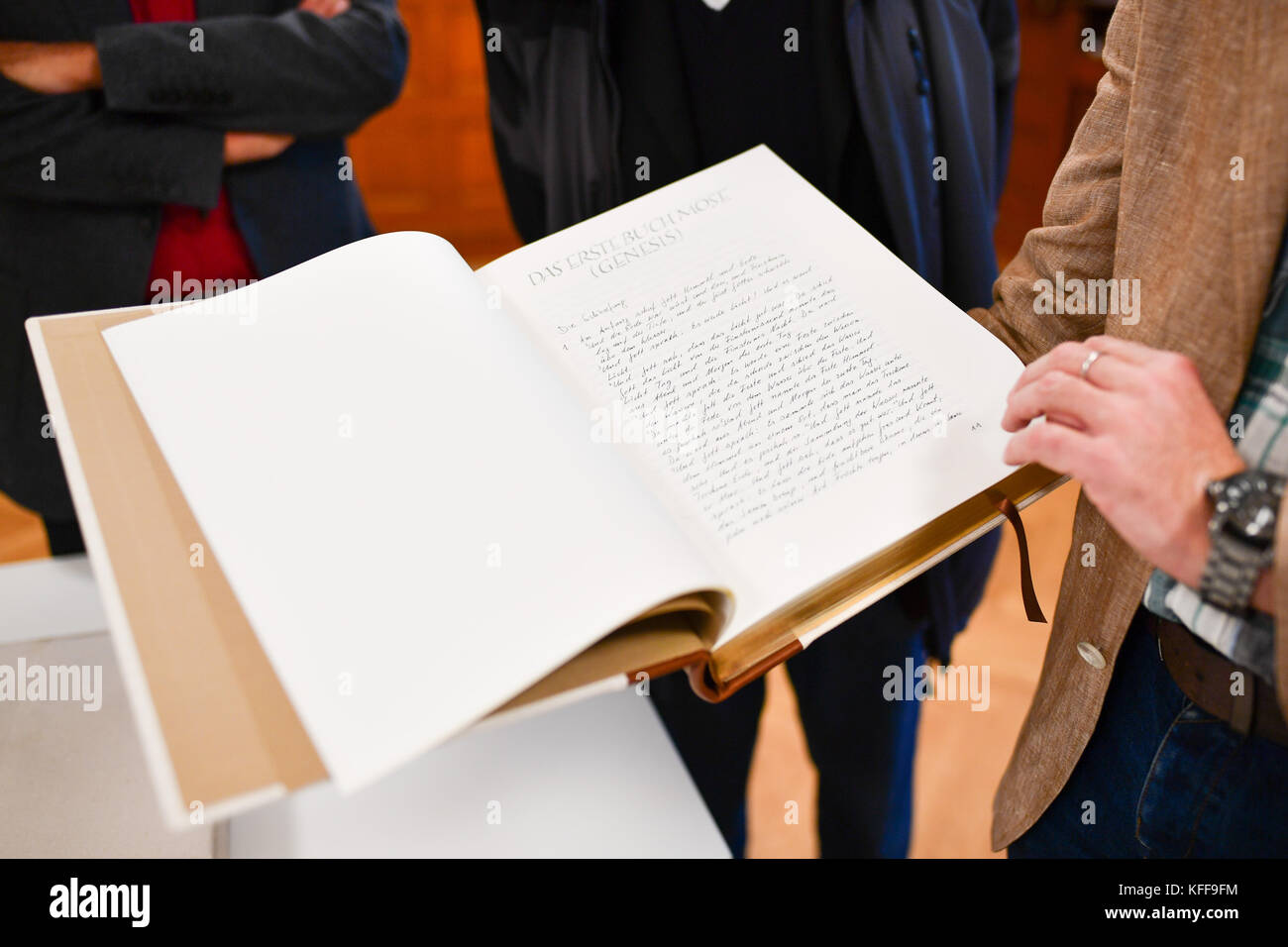 Mannheim, Germany. 27th Oct, 2017. A Luther Bible copied out by hand is presented to the public in Mannheim, Germany, 27 October 2017. A total of 606 people in Mannheim copied out the bible by hand for the anniversary of the reformation, resulting in five volumes with a total of 3,626 pages. Credit: Uwe Anspach/dpa/Alamy Live News Stock Photo