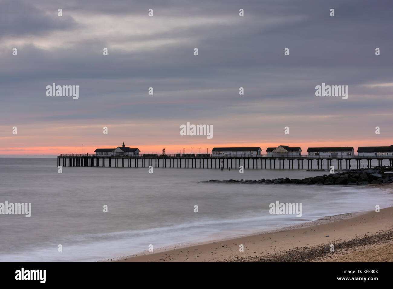Southwold UK 28th October 2017. A cloudy and fresh start on the East Anglian coast at sunrise over the North Sea by Southwold Pier.  A chilly north west breeze has brought autumn temperatures down to around 9 degrees. Credit Julian Eales/Alamy Live News Stock Photo