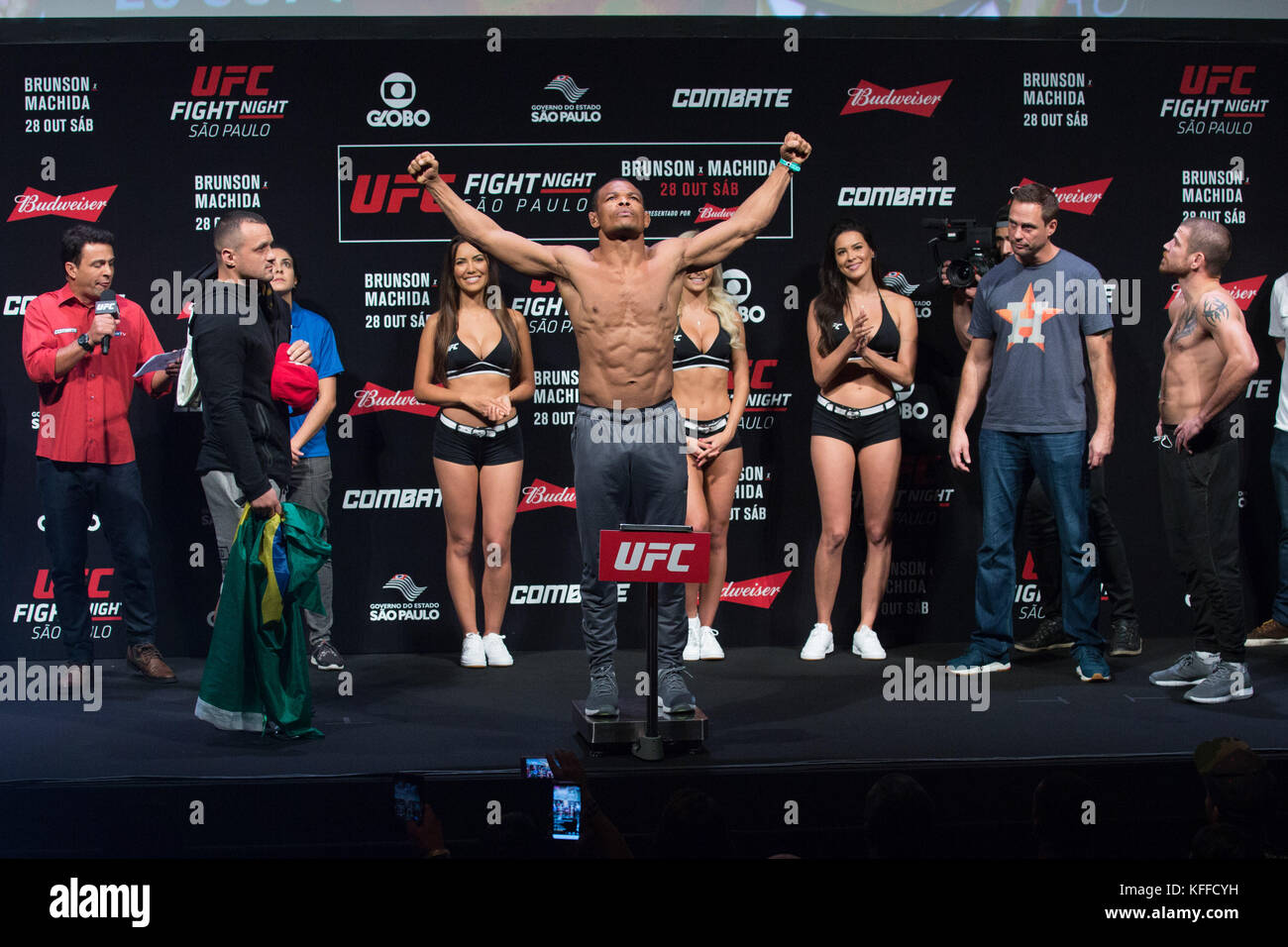 São Paulo, Brazil. 27th October, 2017. UFC fighter Francisco Trinaldo of Brazil poses on the scale after weighing in the UFC weigh-in event prior to the UFC Fight Night Sao Paulo, at the Ibirapuera Gymnasium. Paulo Lopes/BW Press/Alamy Live News Stock Photo