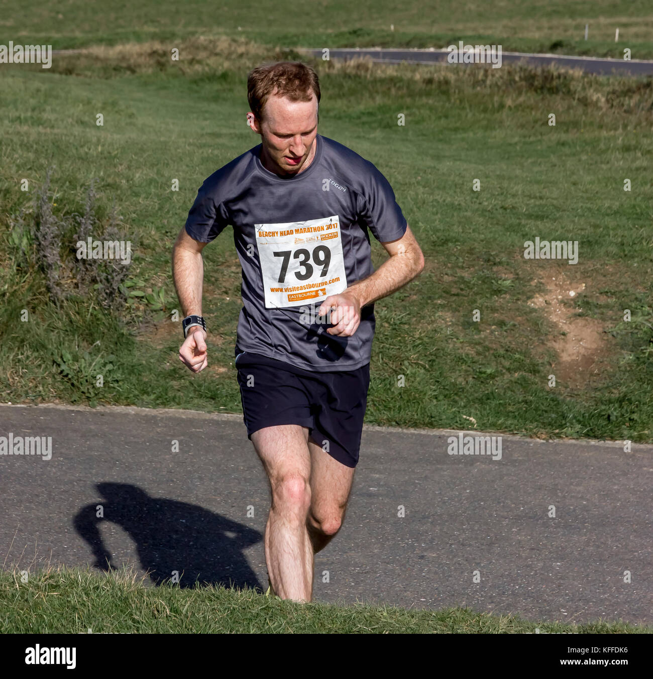 Beachy Head, Eastbourne, East Sussex, United Kingdom. 28th October, 2017. Runners take part in the gruelling Beachy Head marathon. The route crosses  the Seven Sisters on the South downs of Sussex which with its steep cliffside hills makes this one of the toughest marathons in the UK. Credit: Alan Fraser/Alamy Live News Stock Photo