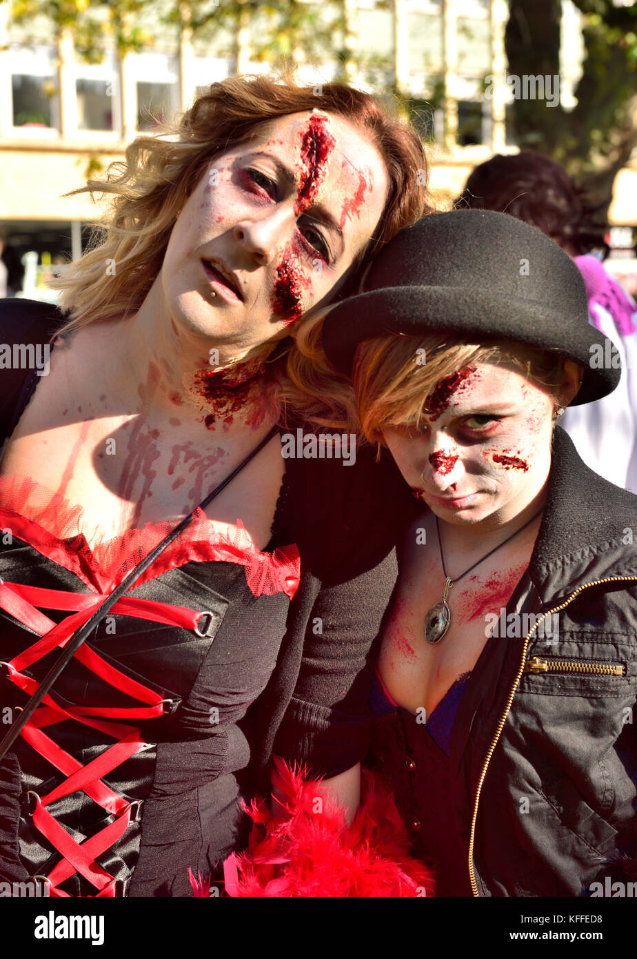 Bristol, UK. 28th Oct, 2017. The undead zombies with representatives from cycling accidents, to newly wed brides and just the dead walk and shuffle through central Bristol in spectacular costumes starting at College Green, past Castle Park to the Bear Pit in preparation for Halloween. At the end of the walk Avon Fire and Rescue Service’s mass decontamination units are set-up in the Bear Pit using the zombies as practice for mass decontamination.  Fun was had along the way with dancing and partying at the end. Credit: Charles Stirling/Alamy Live News Stock Photo