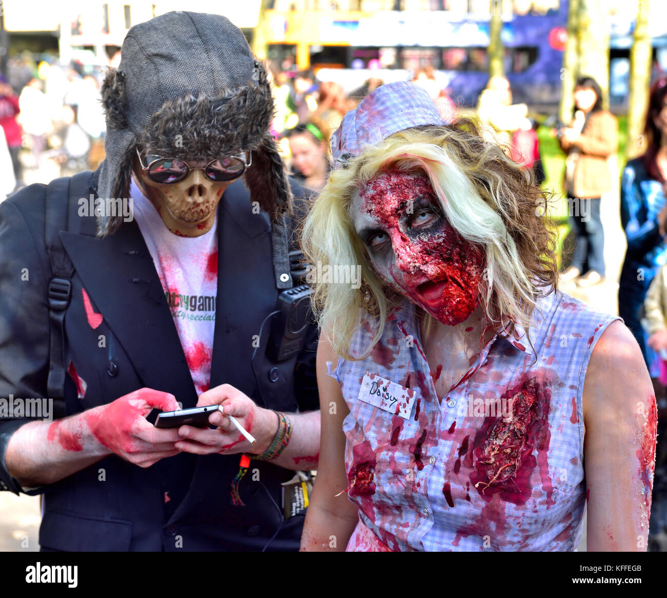 Bristol, UK. 28th Oct, 2017. The undead zombies with representatives from cycling accidents, to newly wed brides and just the dead walk and shuffle through central Bristol in spectacular costumes starting at College Green, past Castle Park to the Bear Pit in preparation for Halloween. At the end of the walk Avon Fire and Rescue Service’s mass decontamination units are set-up in the Bear Pit using the zombies as practice for mass decontamination.  Fun was had along the way with dancing and partying at the end by the many and varied participants. Credit: Charles Stirling/Alamy Live News Stock Photo