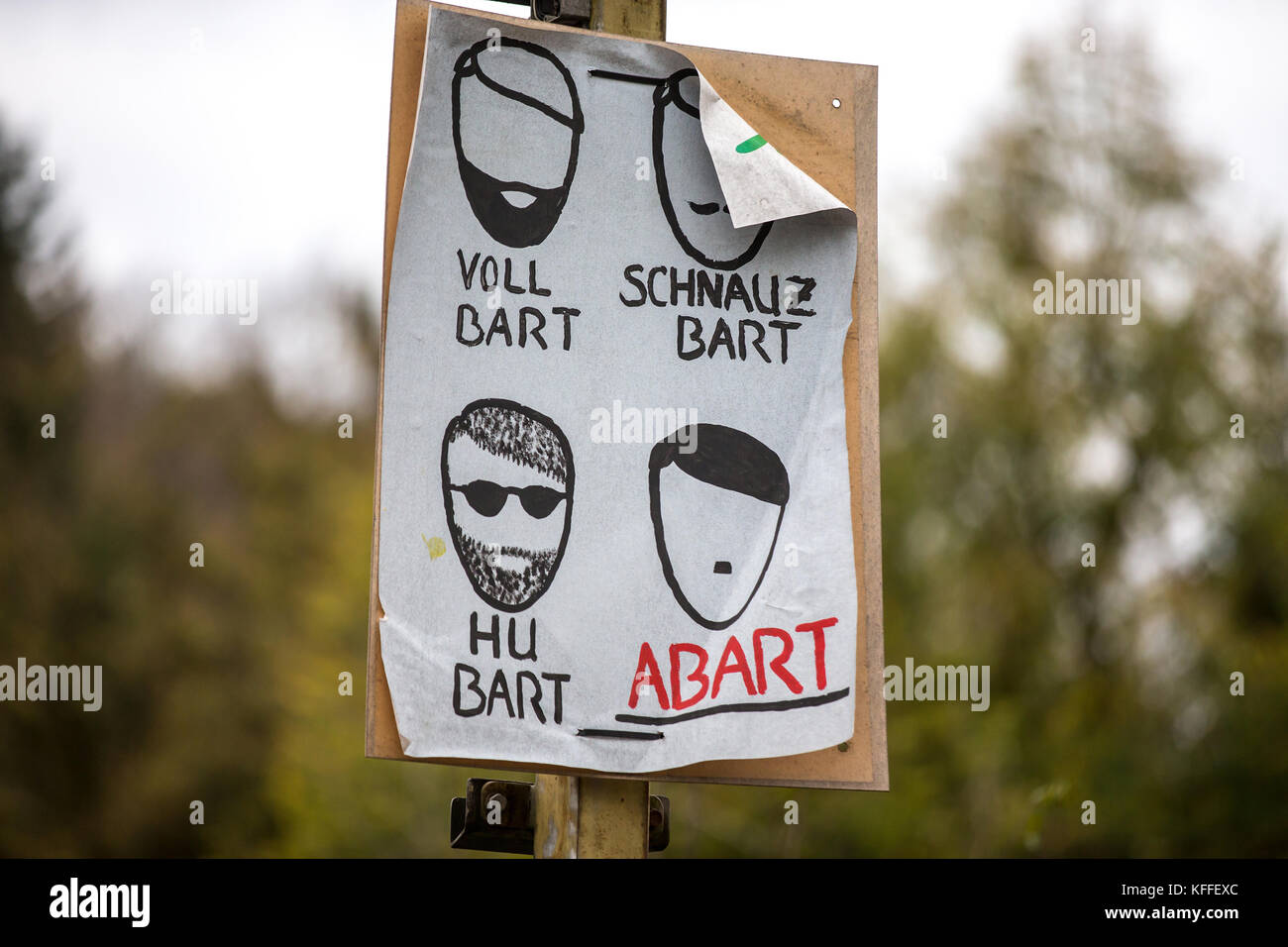 A protestor holds up a placard at a demo against a concert organised by far-right groups in Themar, Germany, 28 October 2017. Around 700 protestors are expected at the demonstration against the open air concert. Photo: Arifoto Ug/Michael Reichel/dpa-Zentralbild/dpa Stock Photo