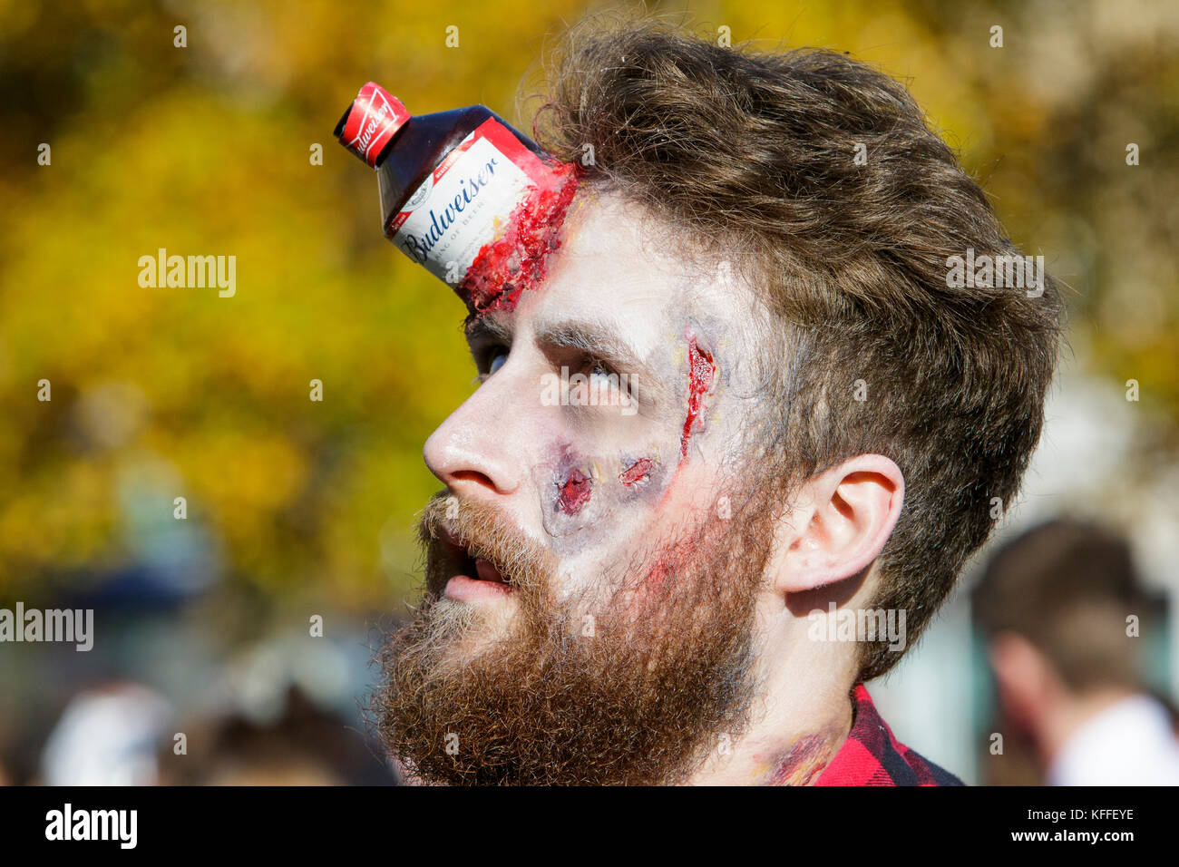 Bristol, UK. 28th Oct, 2017. A man dressed as a zombie is pictured as he participates in a zombie walk through the city centre. Stock Photo