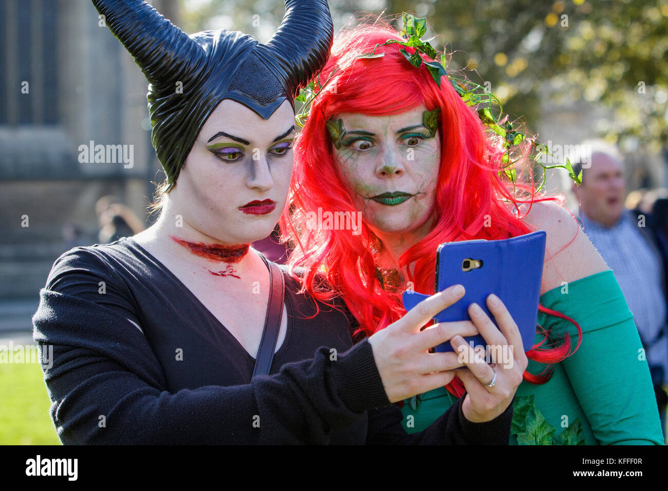 Bristol, UK. 28th Oct, 2017. Two women dressed in fancy dress are pictured as they pose for a selfie during a zombie walk in Bristol. Stock Photo