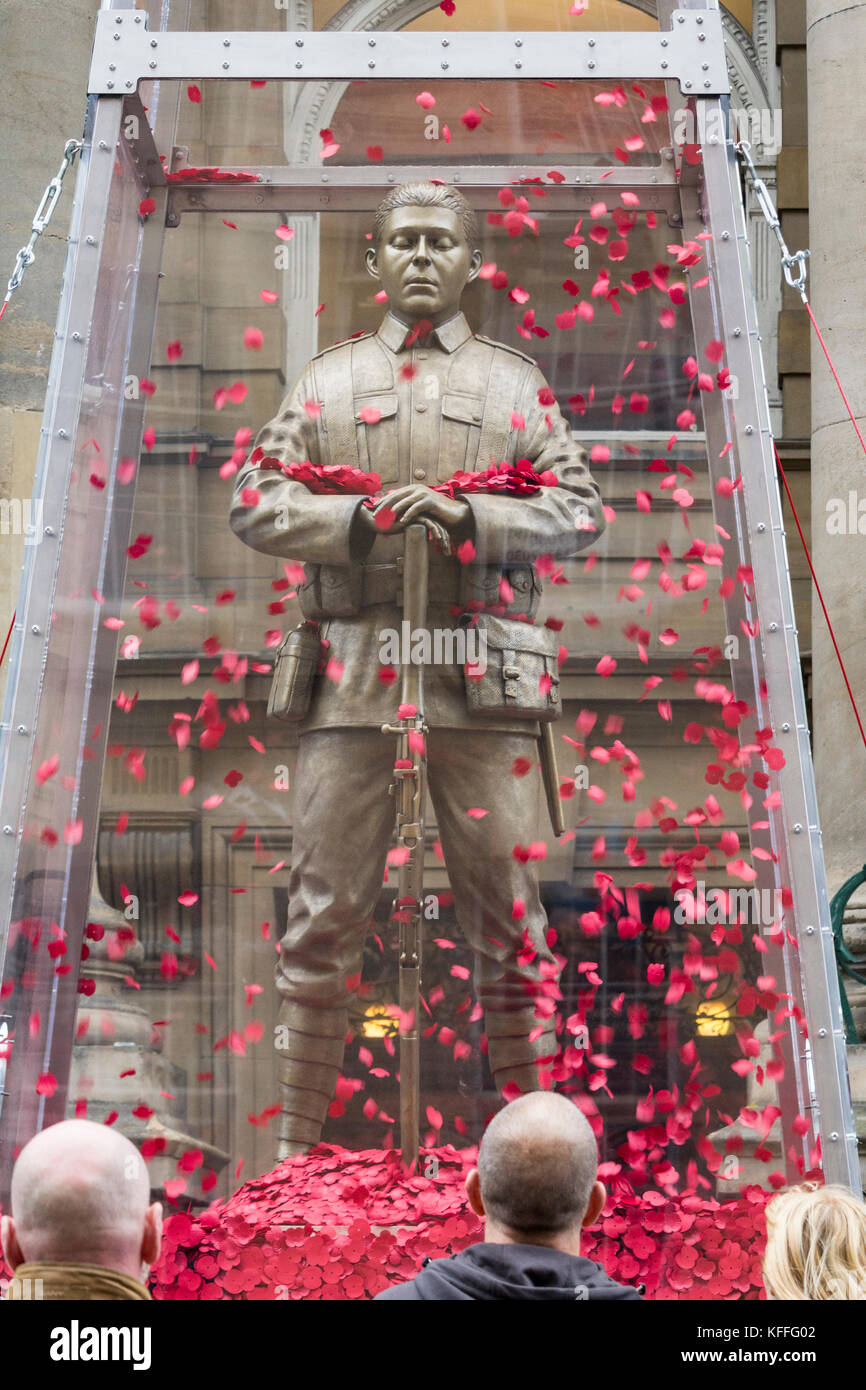 Newcastle upon Tyne England, United Kingdom. 28th October, 2017. Every Man remembered sculpture outside the Theatre Royal in Newcastle upon Tyne. The sculpture promotes the Legion's Every Man Remembered campaign  which asks the public to pay tribute to each of the 1,117,077 men and women from Britain and the Commonwealth who fell during the First World War The brass sculpture is a collaborative piece with artist Mark Humphrey and has been created with the assistance of a team of British makers. Based on the Unknown Soldier, he stands on a block made from limestone sourced from the Somme, in a  Stock Photo