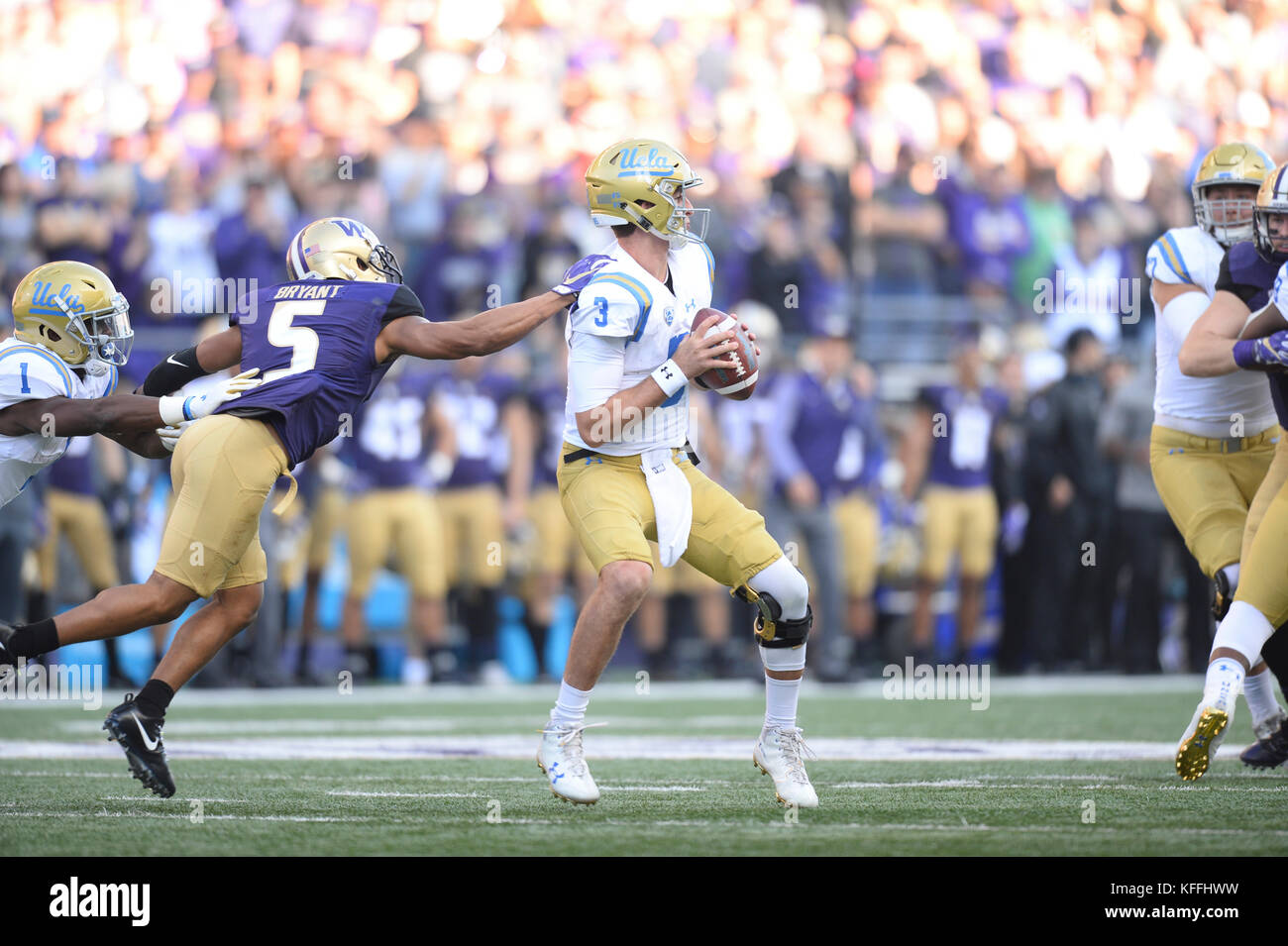 Seattle, WA, USA. 28th Oct, 2017. UCLA quarterback Josh Rosen (3) gets pressure from UW defender Myles Bryant (5) during a PAC12 football game between the UCLA Bruins and the Washington Huskies. The game was played at Husky Stadium on the University of Washington campus in Seattle, WA. Jeff Halstead/CSM/Alamy Live News Stock Photo
