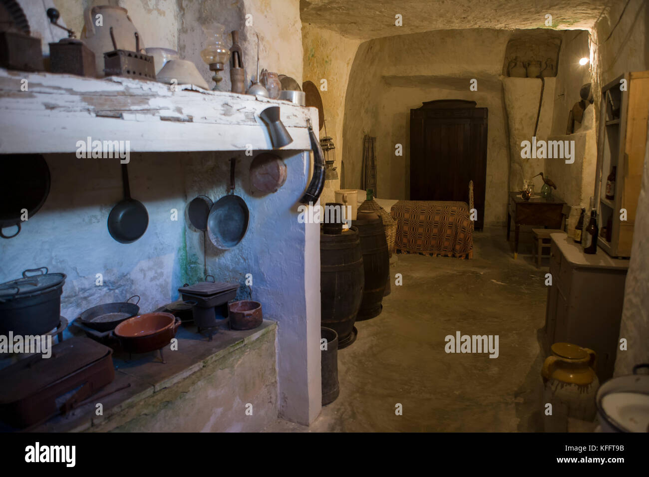 Interior of a cave dwelling (the Casa grotta del Casalnuovo) restored as a living museum in the Sasso Caveoso, Matera, Basilicata, Italy Stock Photo
