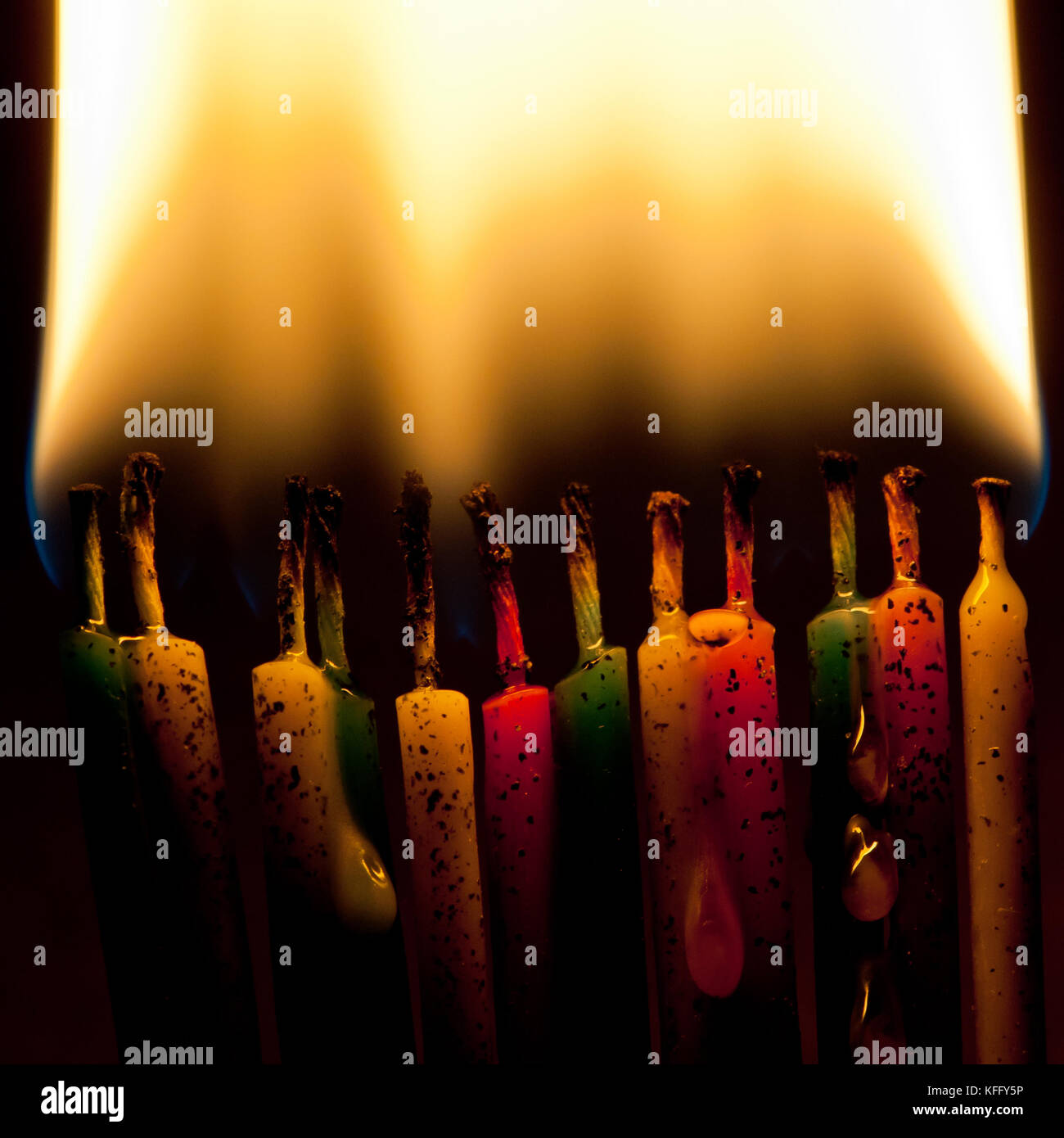 A macro shot of some burning birthday candles. Stock Photo