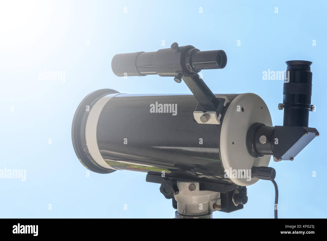 Solar eclipse observing with telescope. Telescope with solar filter