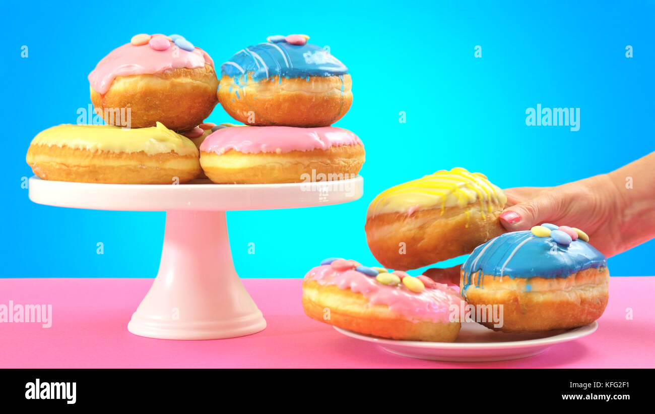 Pop Art Color style donuts and bakery goodies on bright colorful background. Stock Photo