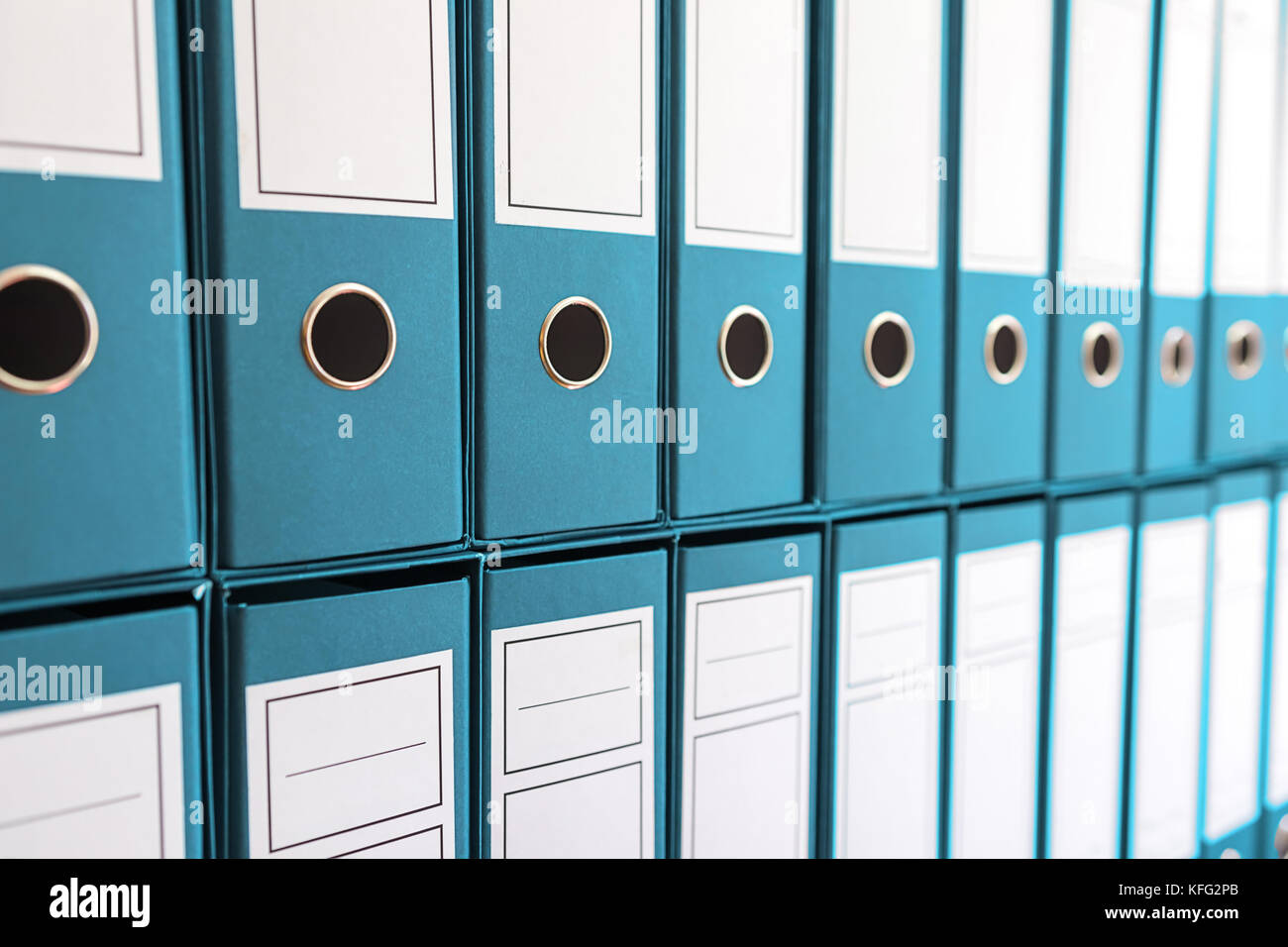 Binder folders in shelf, binders in a row Stock Photo Alamy