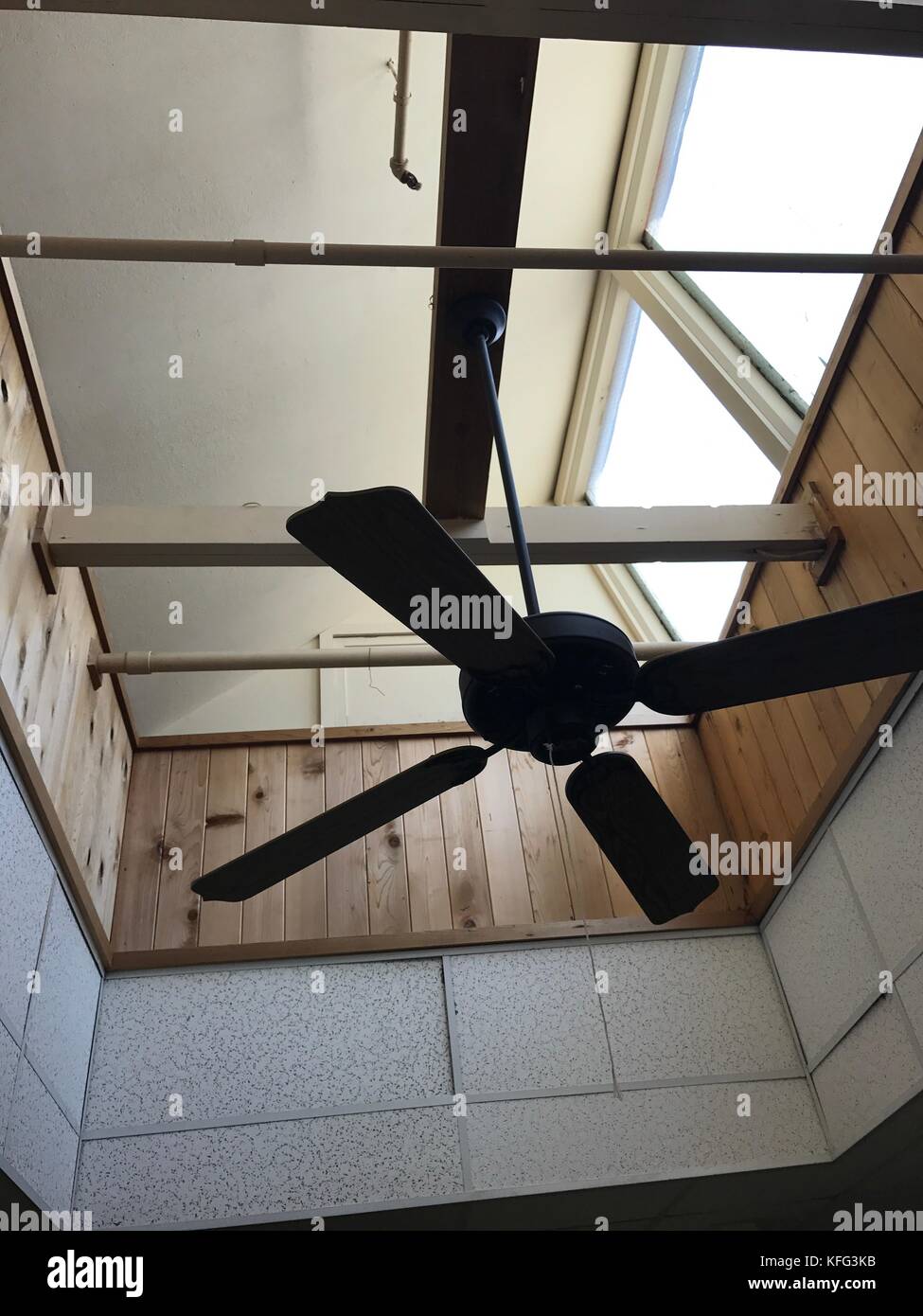 Ceiling fan in skylight Stock Photo Alamy