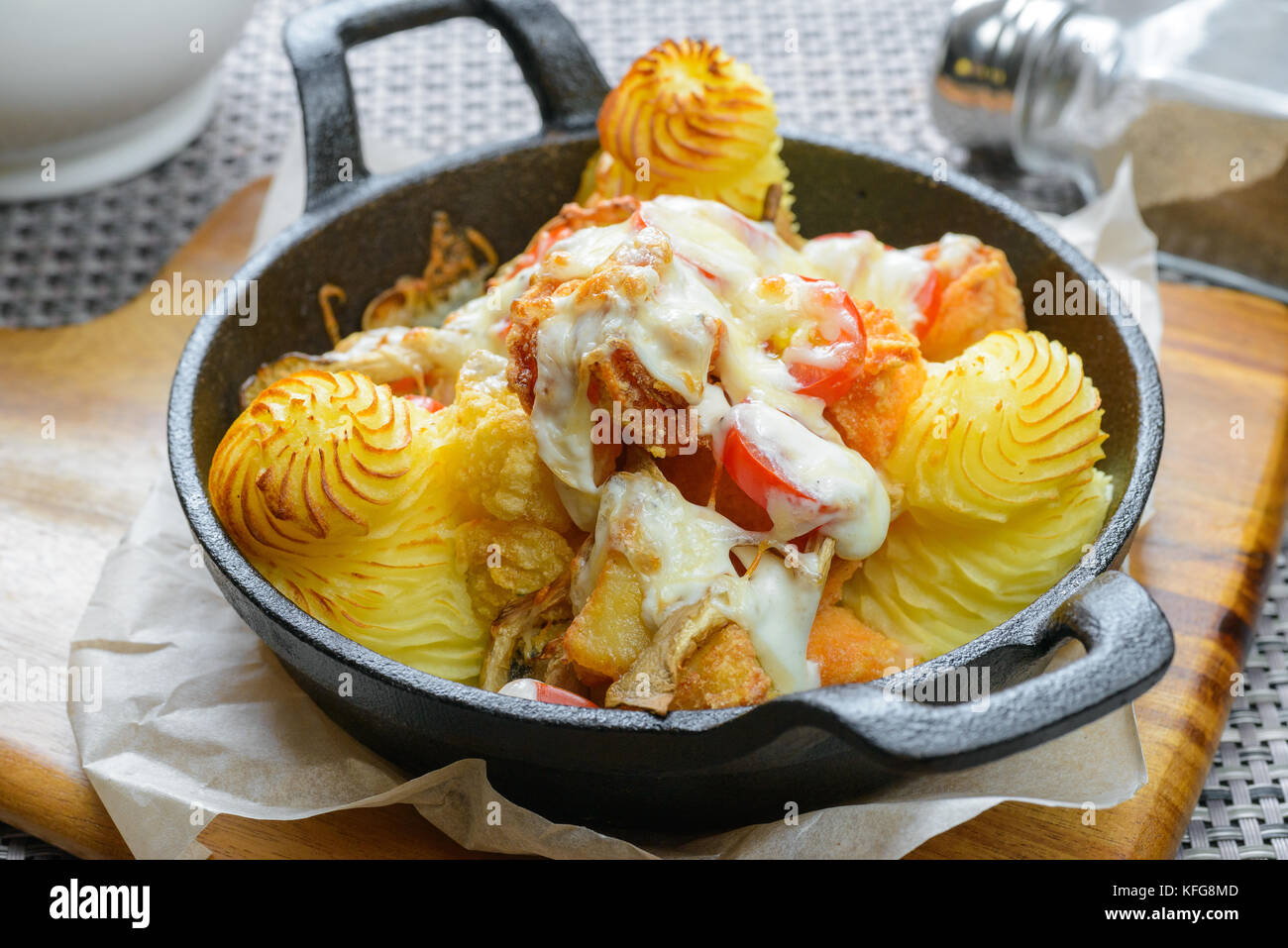 Mashed potatoes with meat and vegetables in frying pan Stock Photo