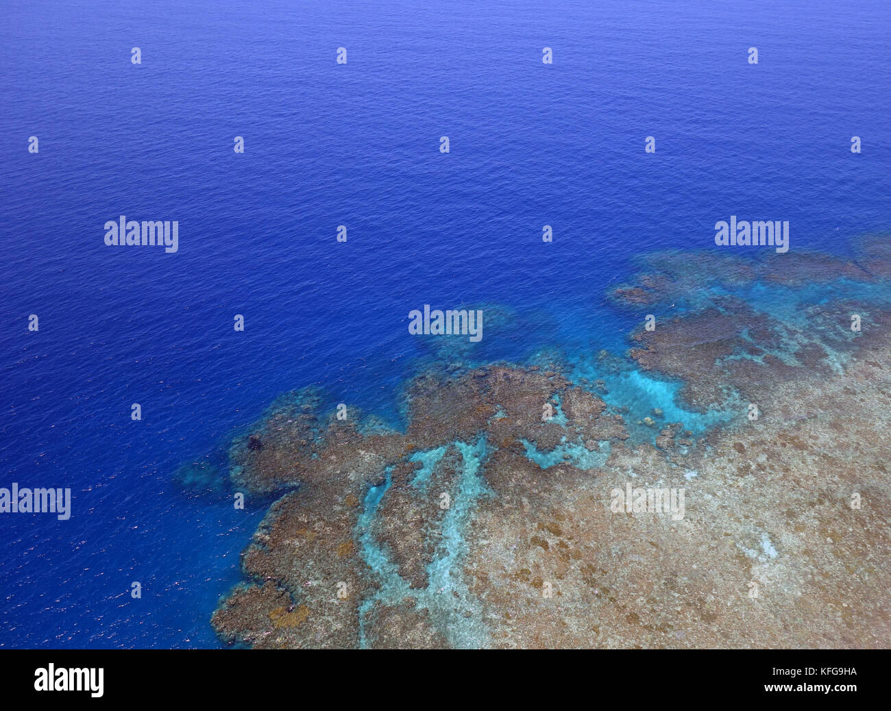 Aerial view of seaward edge of Moore Reef, Great Barrier Reef near Cairns, Queensland, Australia Stock Photo