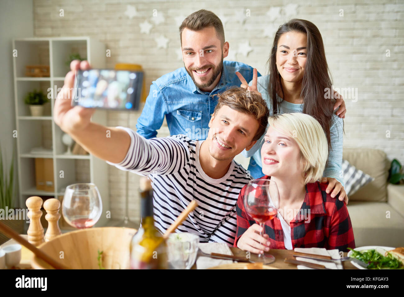 Friend Posing for Selfie at Dinner Party Stock Photo - Alamy