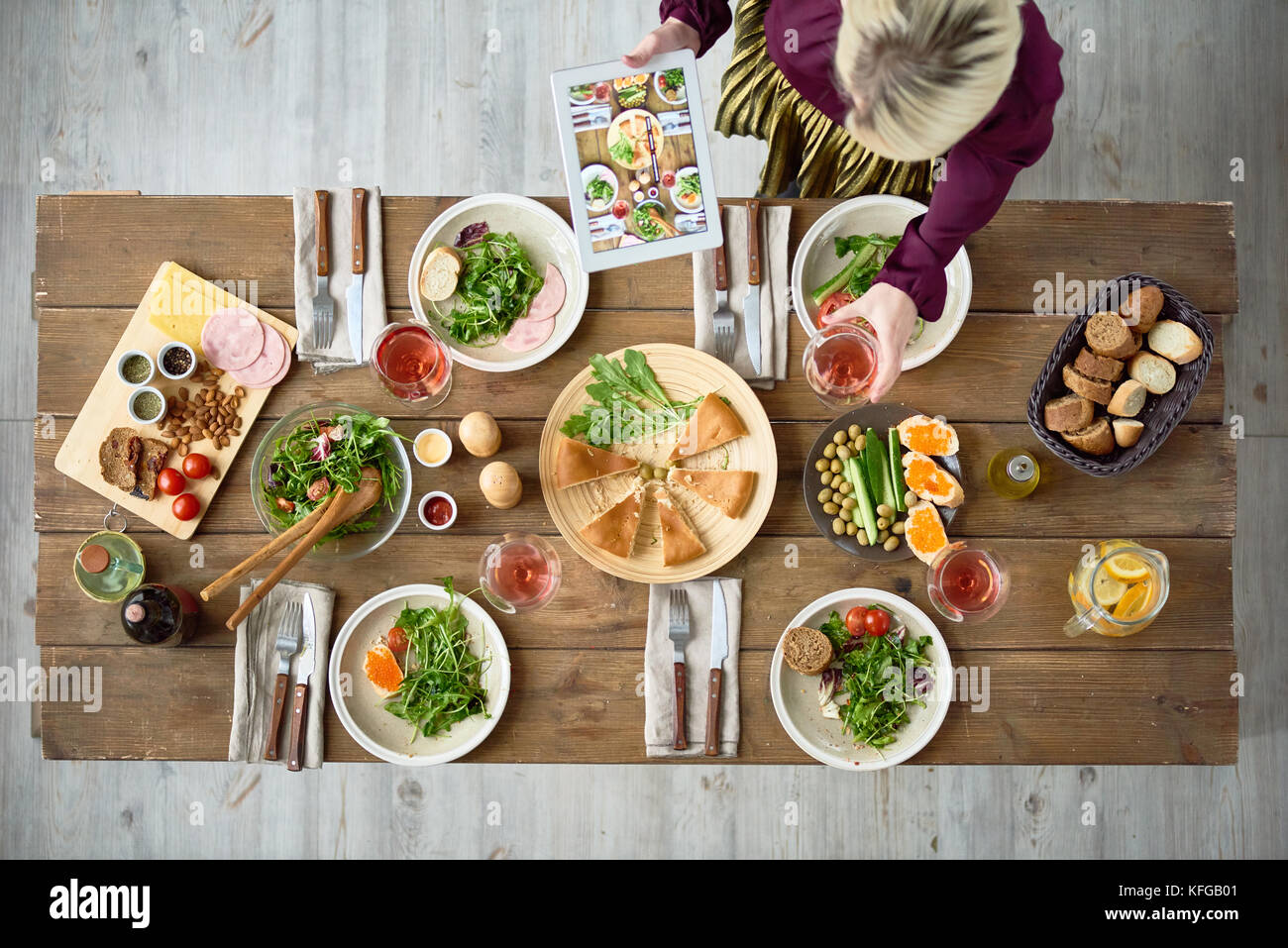 Festive Dinner Table with Food Stock Photo