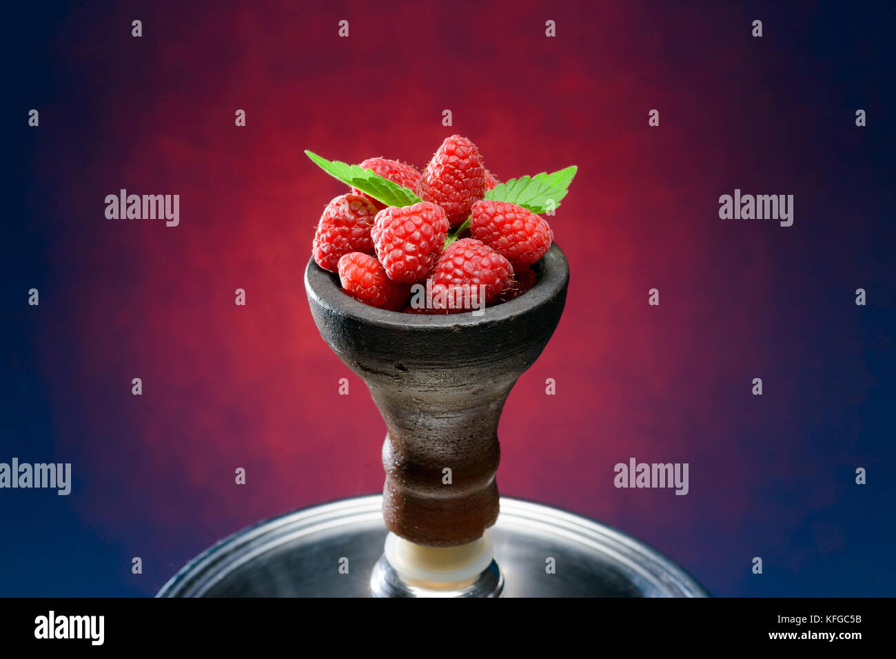 Closeup of hookah head filled with berries Stock Photo Alamy