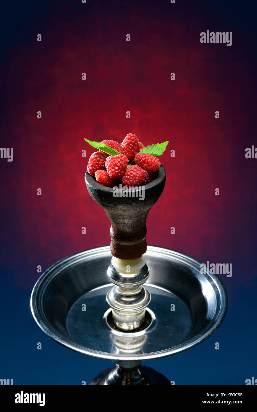 Closeup of hookah head filled with berries Stock Photo Alamy