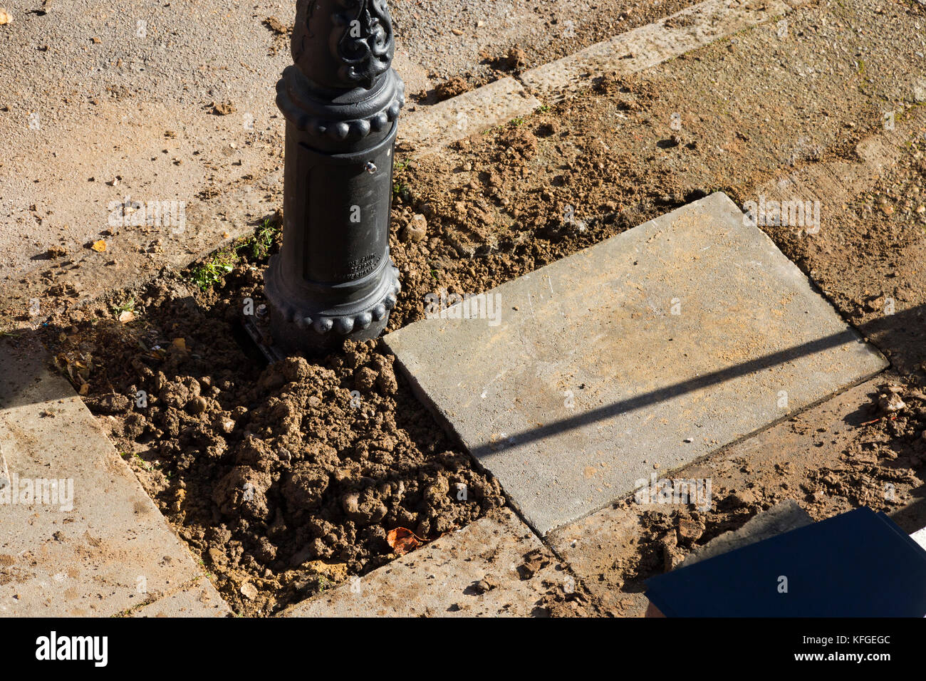 Team of lighting contractors fitting a Heritage street lamp / street