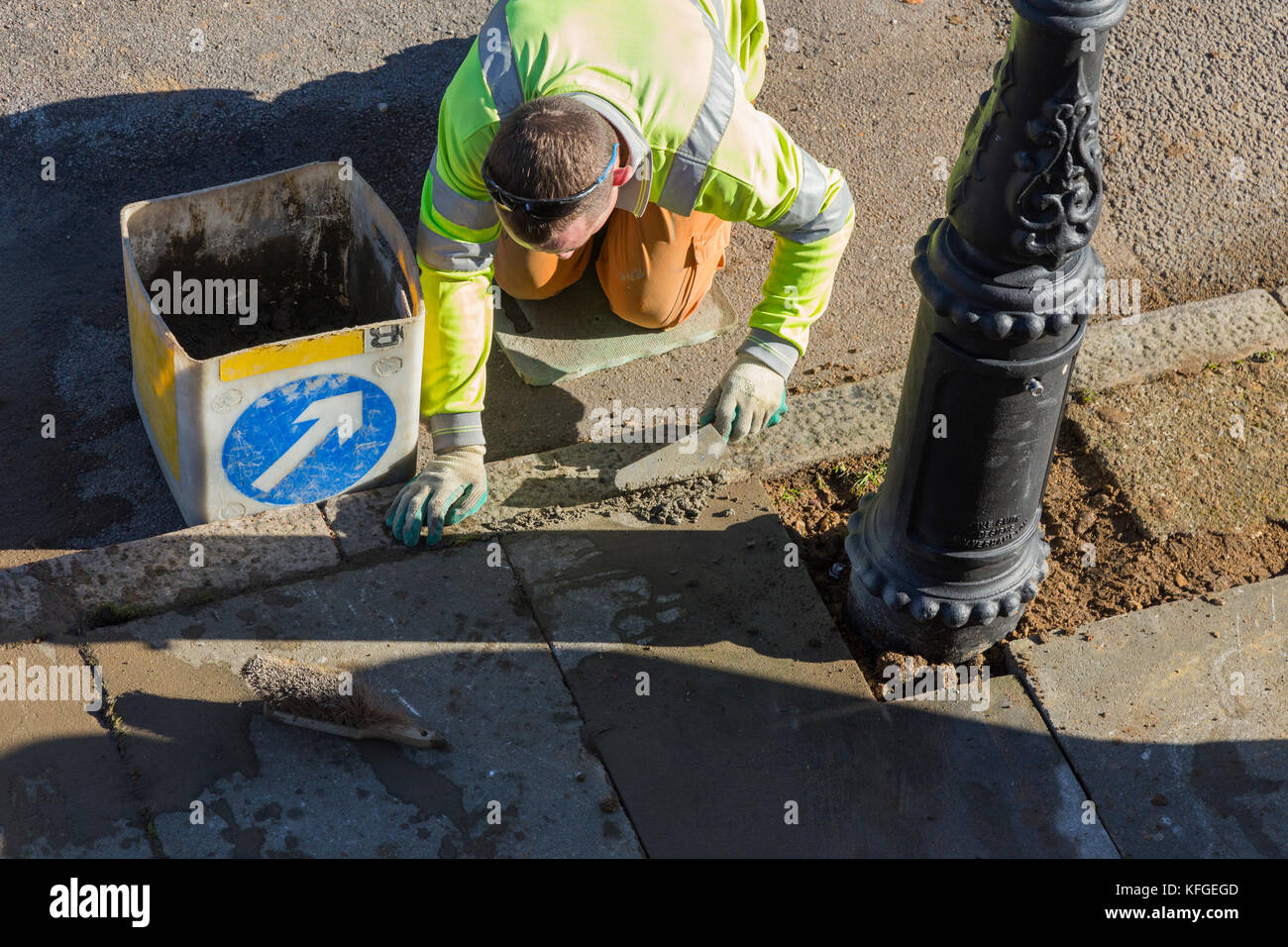 Team of lighting contractors fitting a Heritage street lamp / street