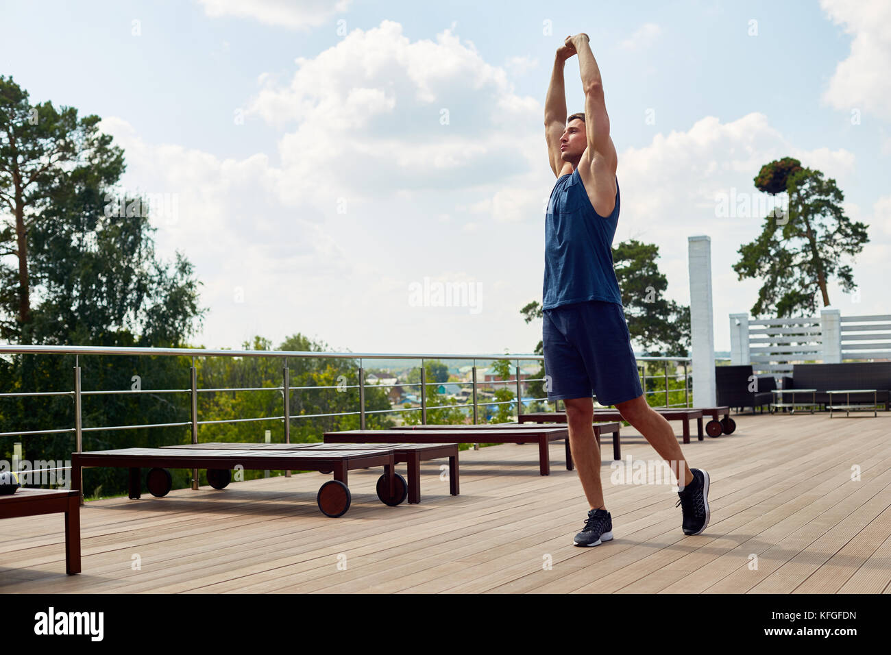 Handsome Man Stretching Outdoors Stock Photo - Alamy