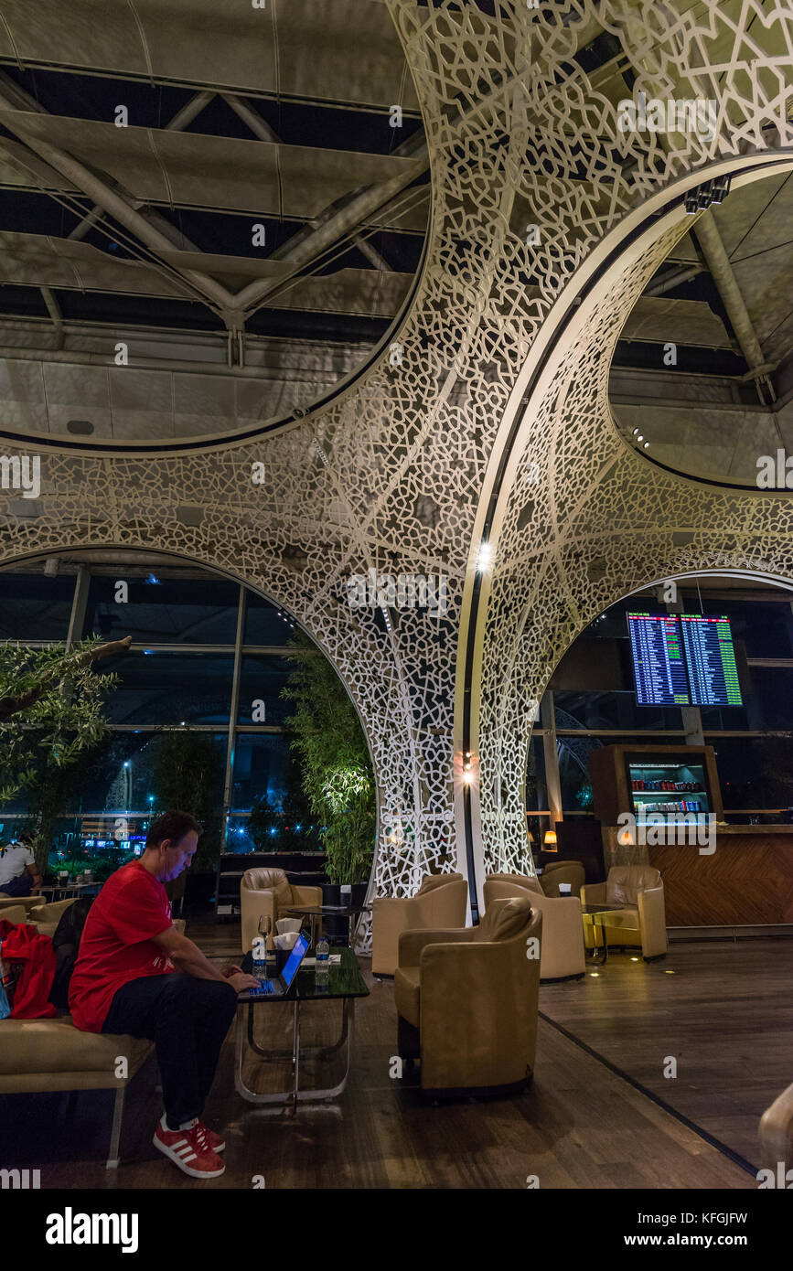 Traveler working on his laptop inside Turkish Airline Premier Lounge