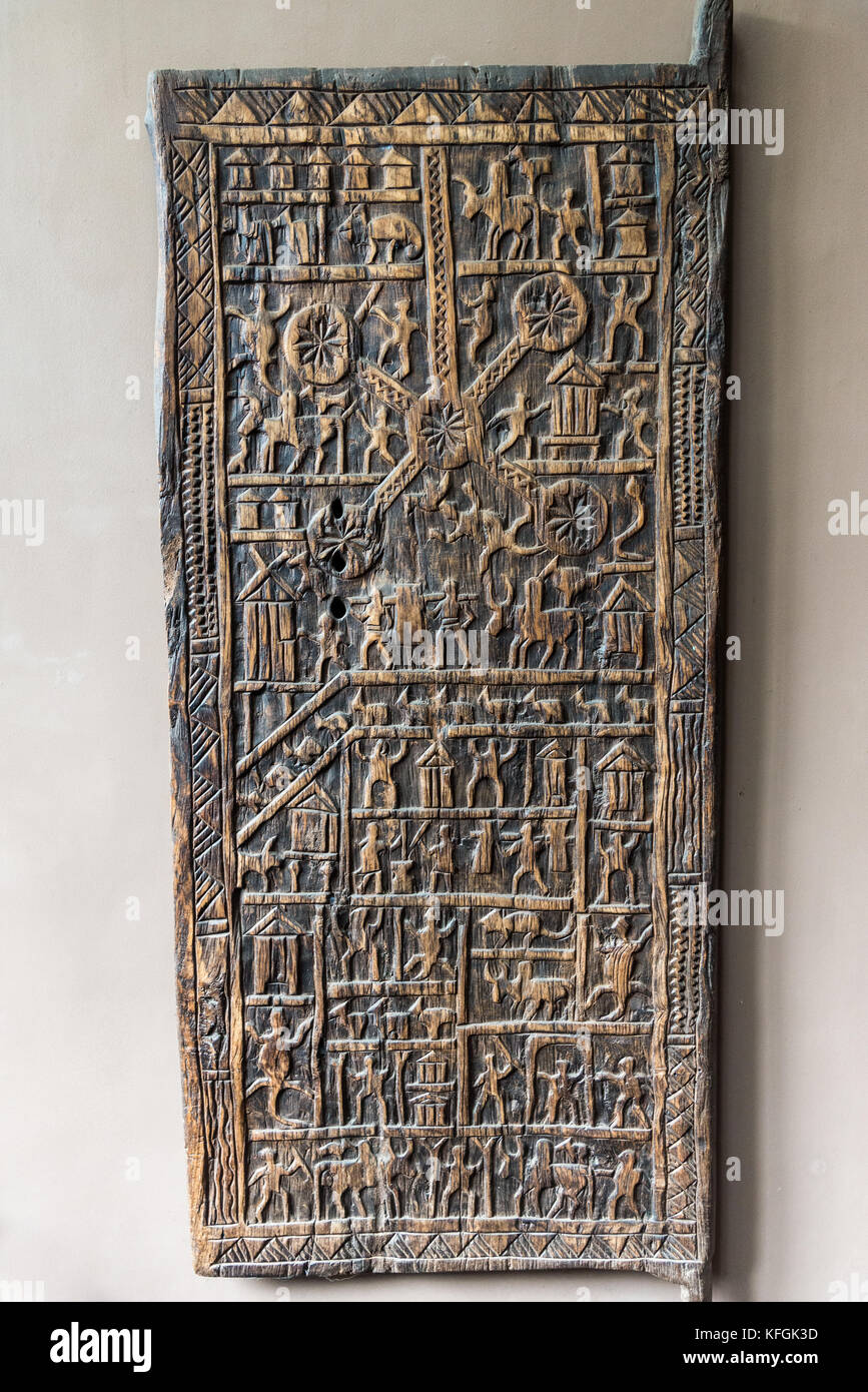 An old wood carved door with detailed picture. Antananarivo, Madagascar. Stock Photo