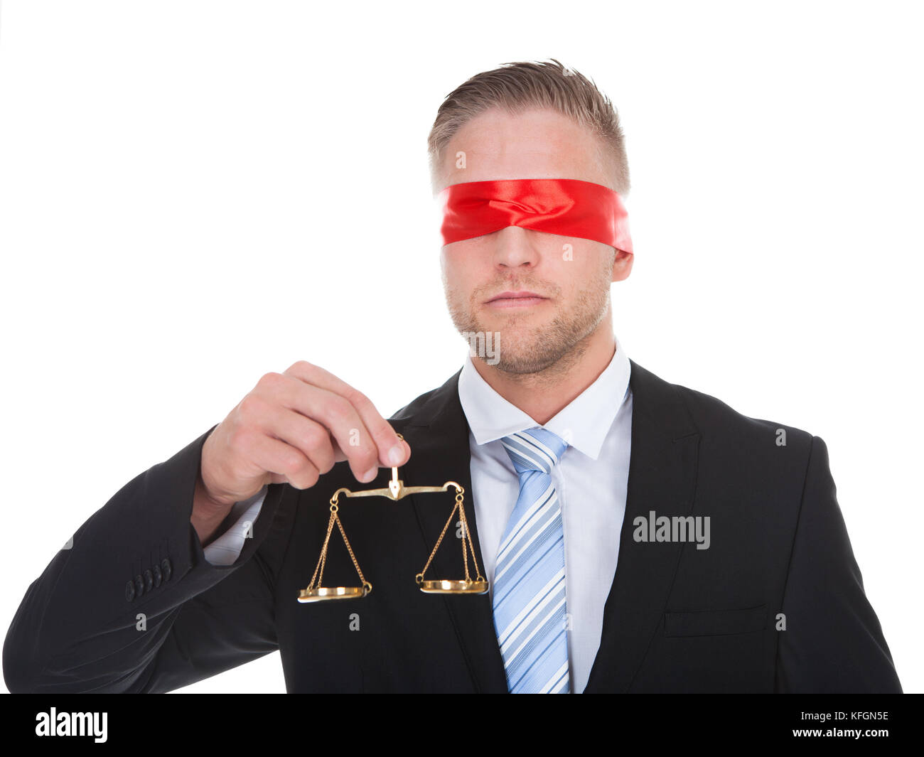 Lawyer or judge with the scales of justice in his hand wearing a blindfold  conceptual of impartiality and fairness Stock Photo