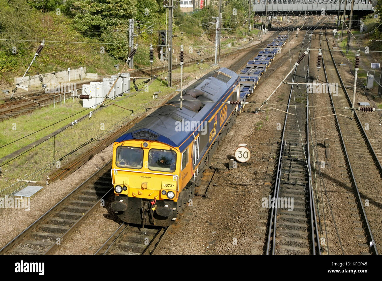 GBRF class 66 diesel locomotive 66737 with a short southbound empty wagon service passing through York. Stock Photo