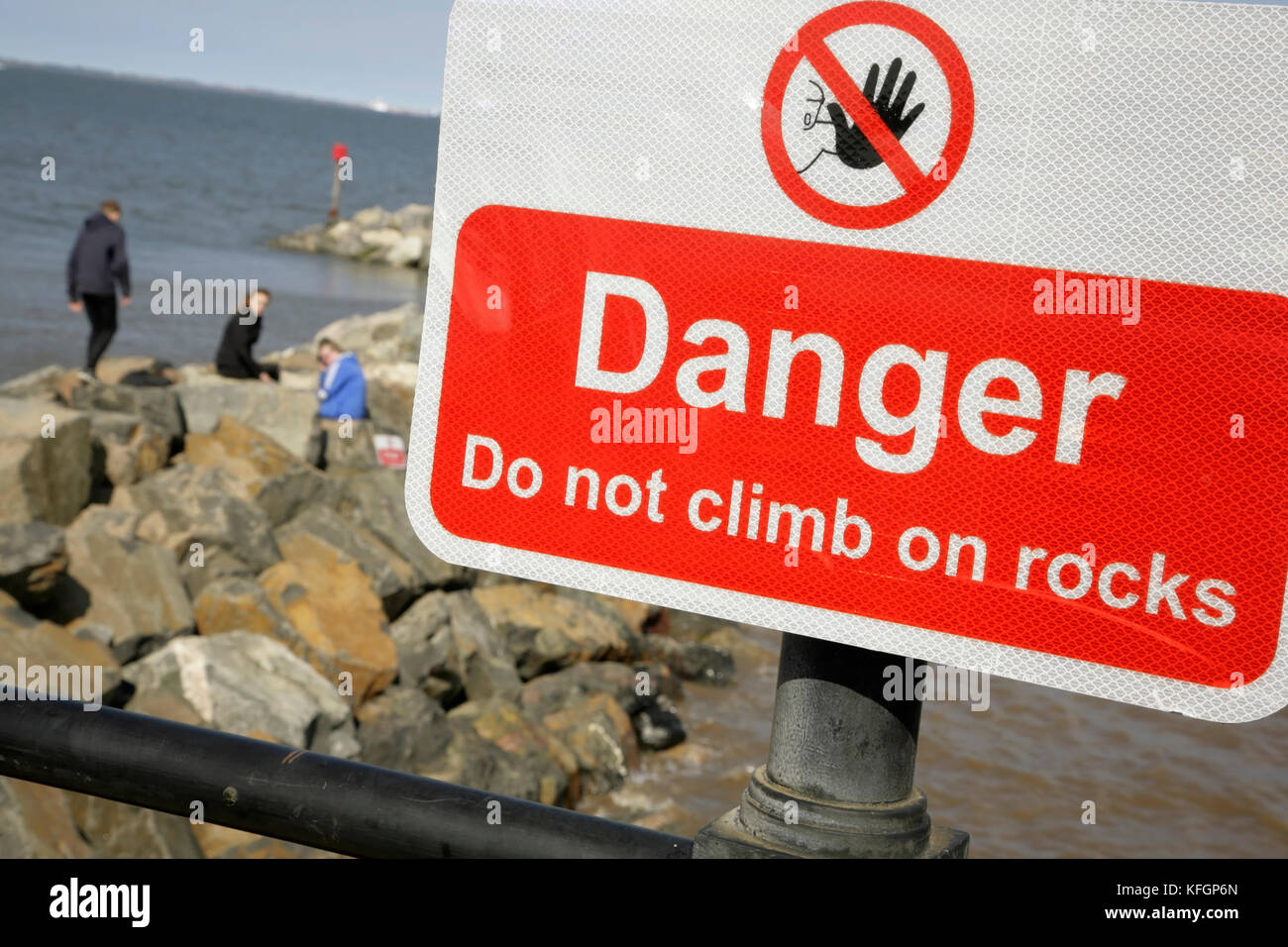 Danger sign warning of risks associated with climbing on the rock