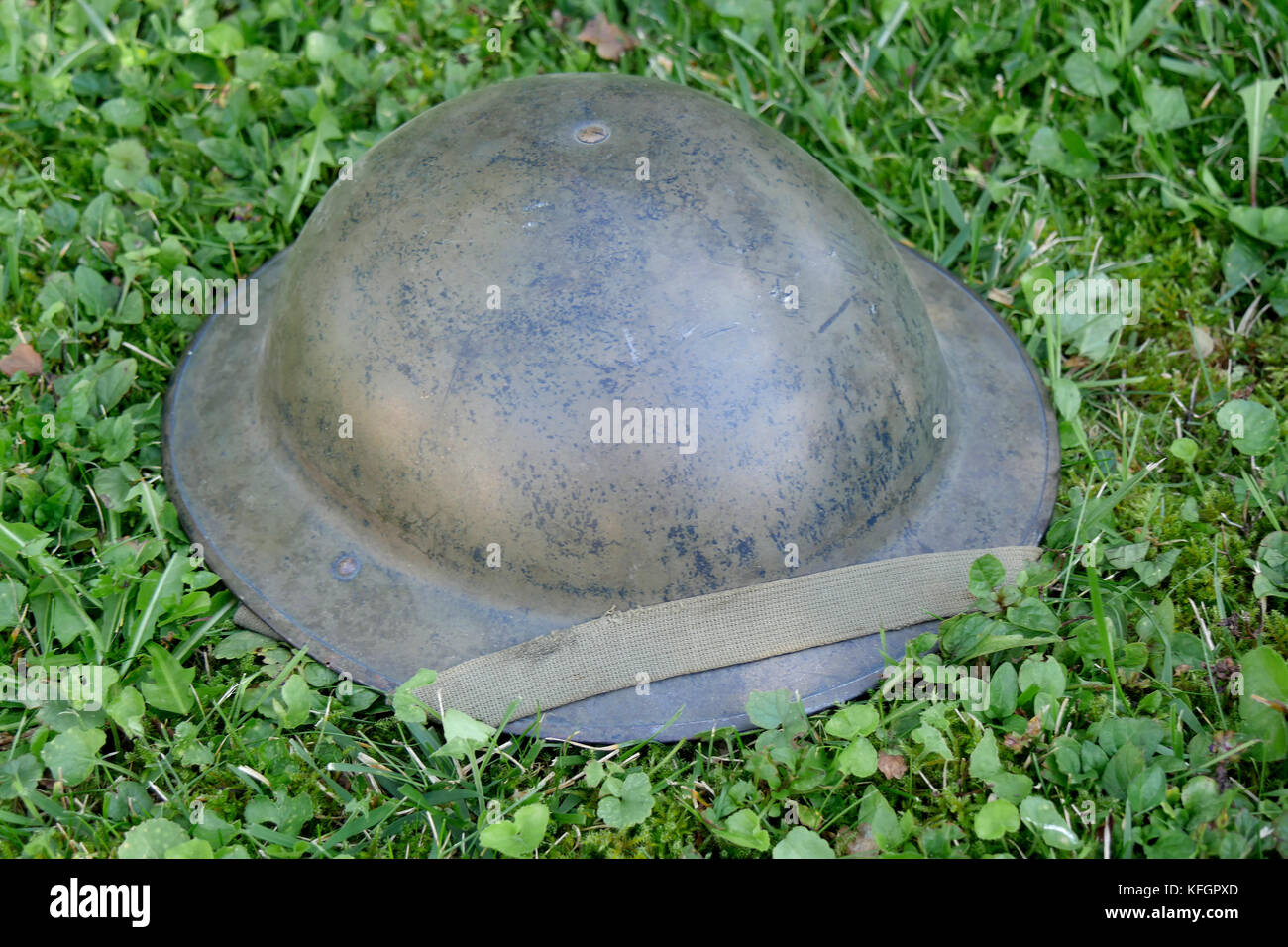 the wwii british helment on the grass Stock Photo