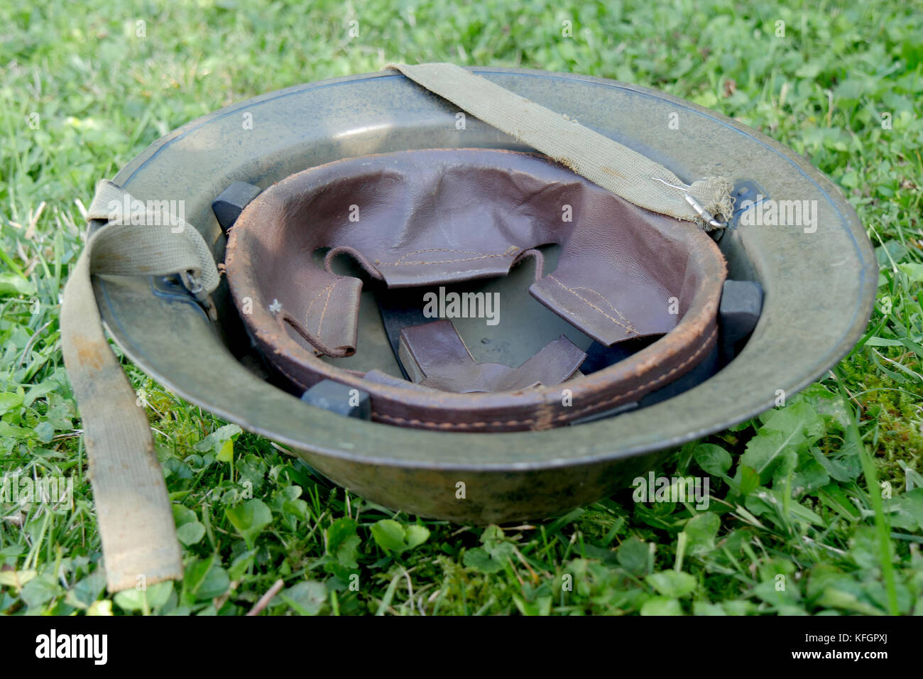 the wwii british helment on the grass Stock Photo
