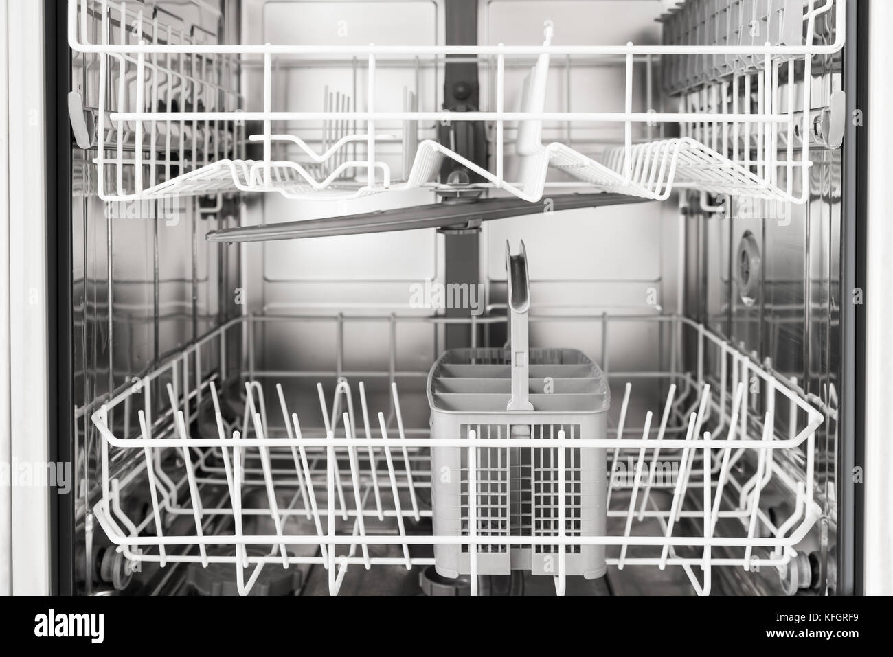 Closeup Photo Of An Empty Opened Dishwasher Stock Photo Alamy