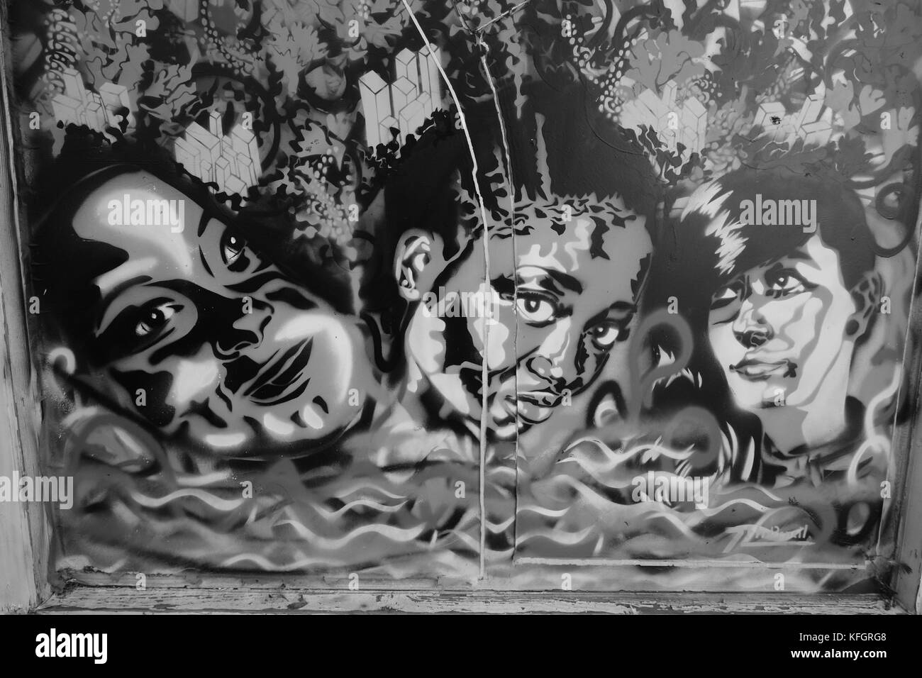 Bideford graffiti three faces in black and white Stock Photo