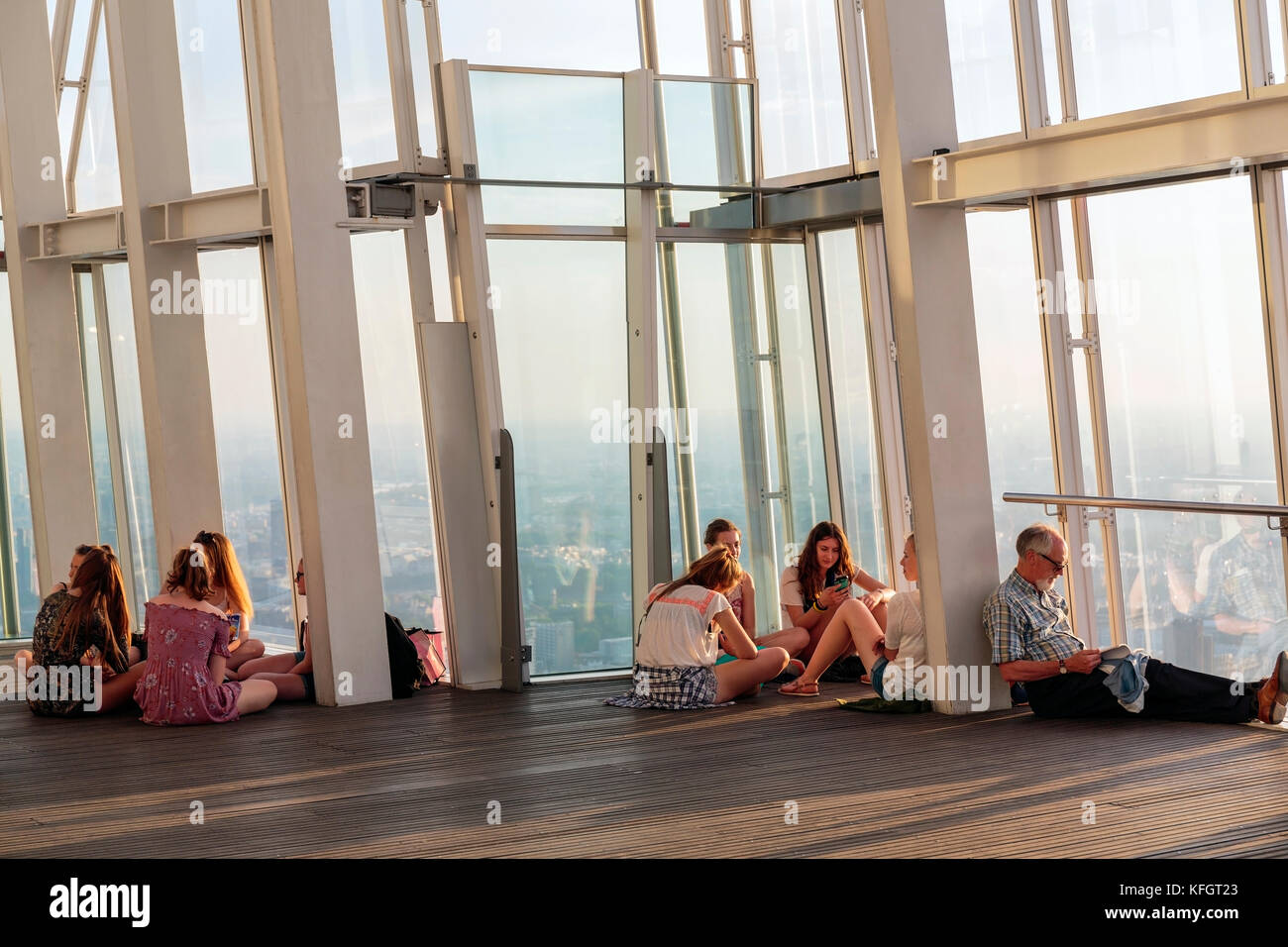 People at The Shard viewing platform at sunset in London Stock Photo