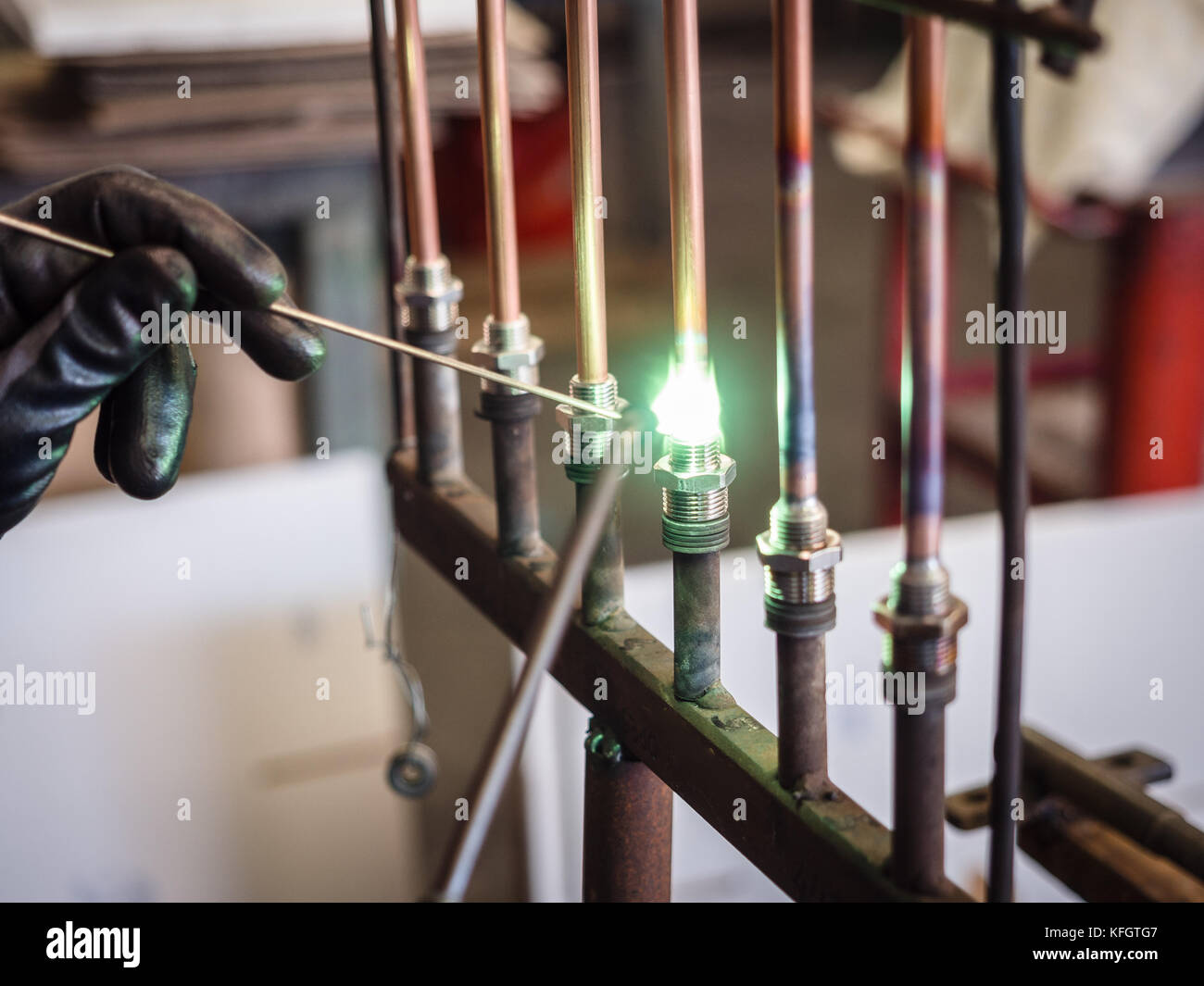 Detail of soldering of brass fittings on copper pipe Stock Photo Alamy