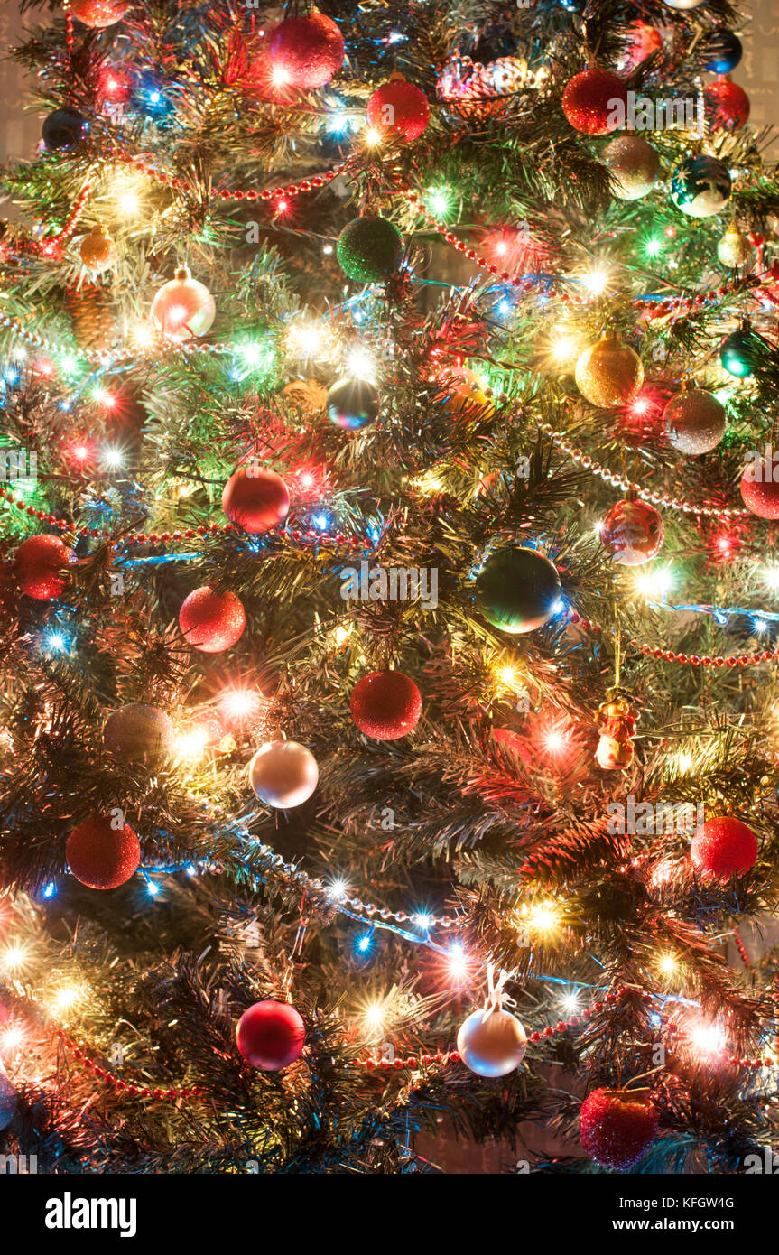 Part of decorated christmas tree- lights and toys Stock Photo