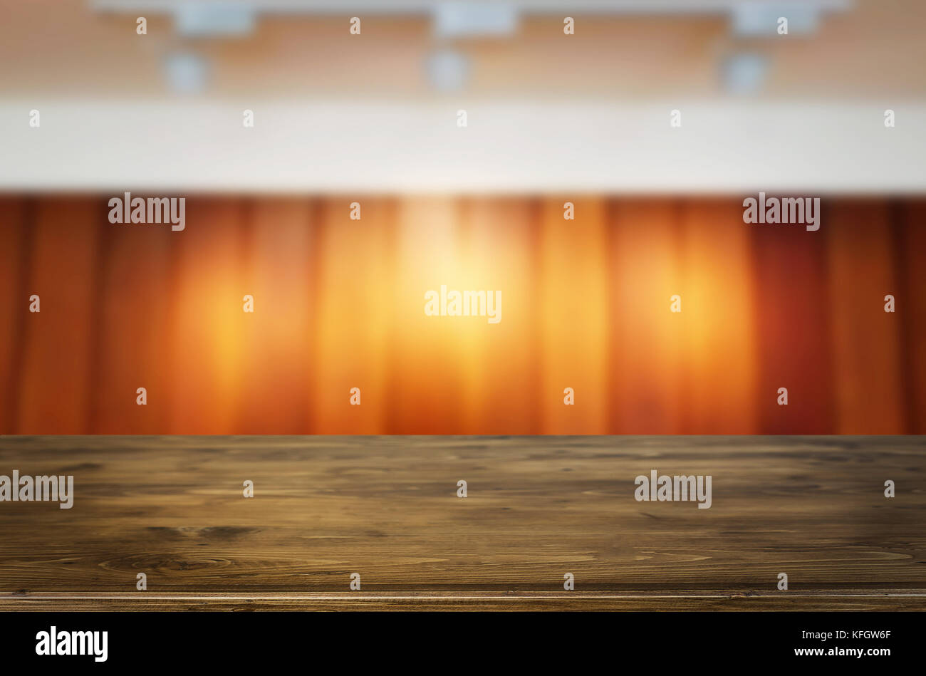 Empty wood table and blurred booked cafe light background. product display template. Business presentation. Stock Photo
