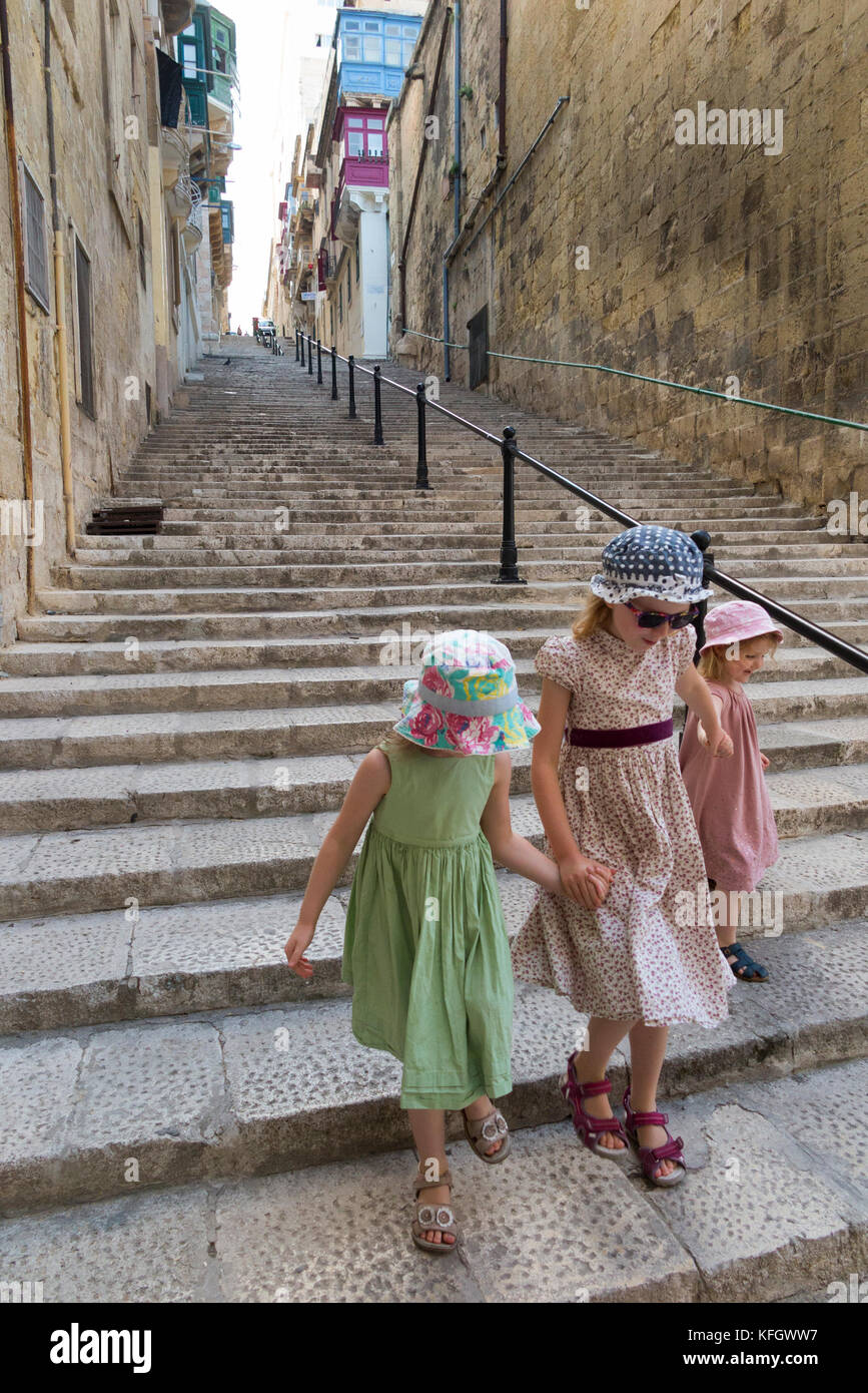 Girls / children / kids / child / kid walking up and down stairs steps