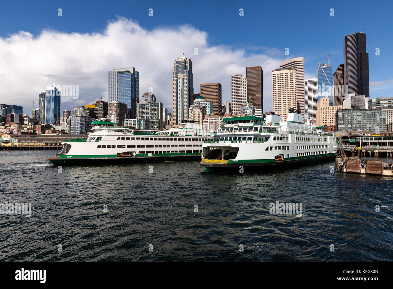 WA14048-00...WASHINGTON - Ferry boats and down town Seattleviewed from the deck of the Seattle to Bremerton Ferry. Stock Photo