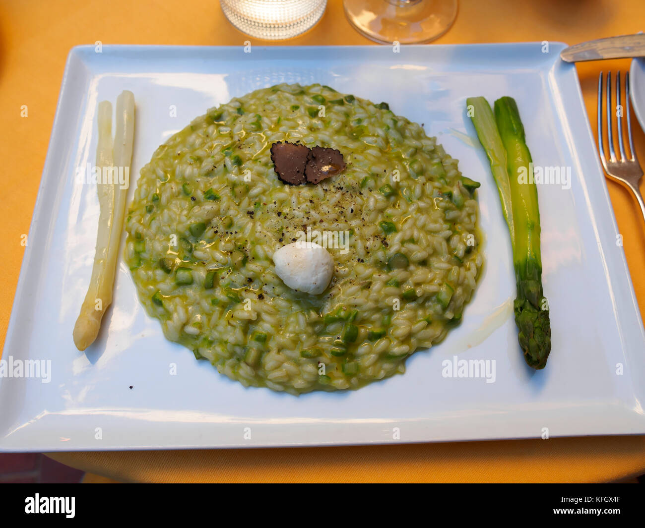 Asparagus and truffle risotto with a quail egg Stock Photo